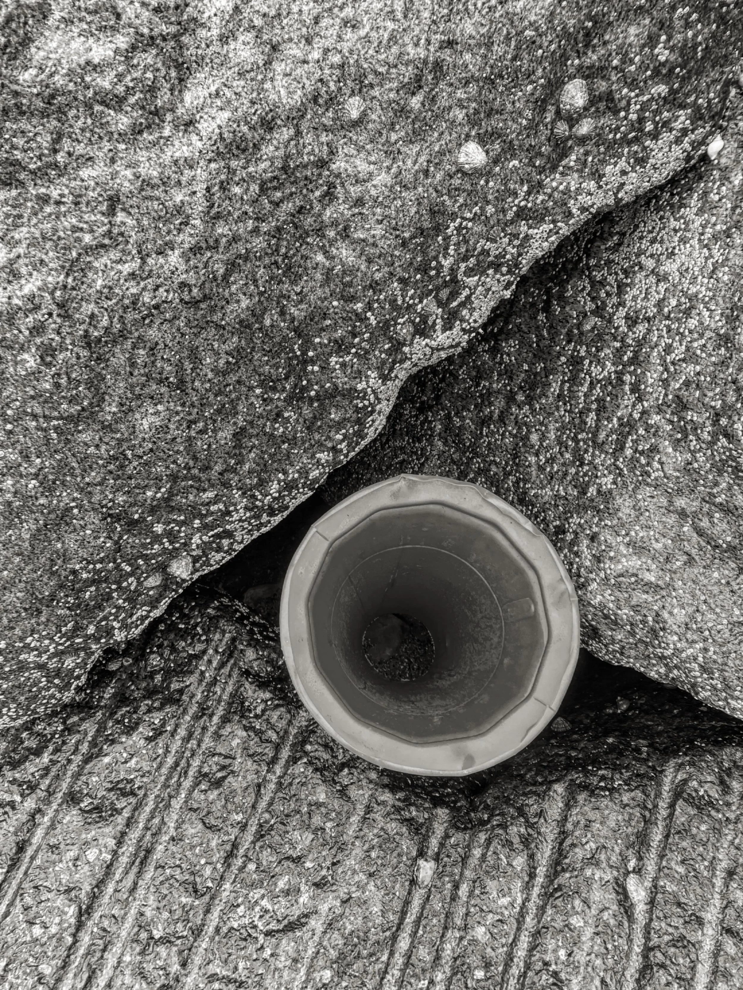 A simple cone gauge, used to test the suitability of 
available spaces for PodPool deployment between granite boulders.
R&amp;D with @envagency