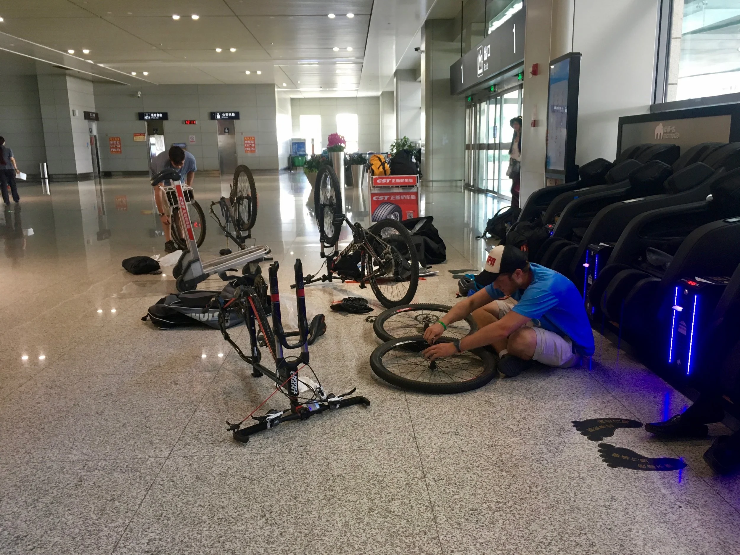 Departing from Shanghai, we disassembled our bikes, threw them in bags, put "Fragile" stickers on them and hoped for the best. No baggage fee and to our surprise we arrived in Xining Airport with our bicycles undamaged. Apparently U.S. airlines need to take some tips from their competitors across the pond.