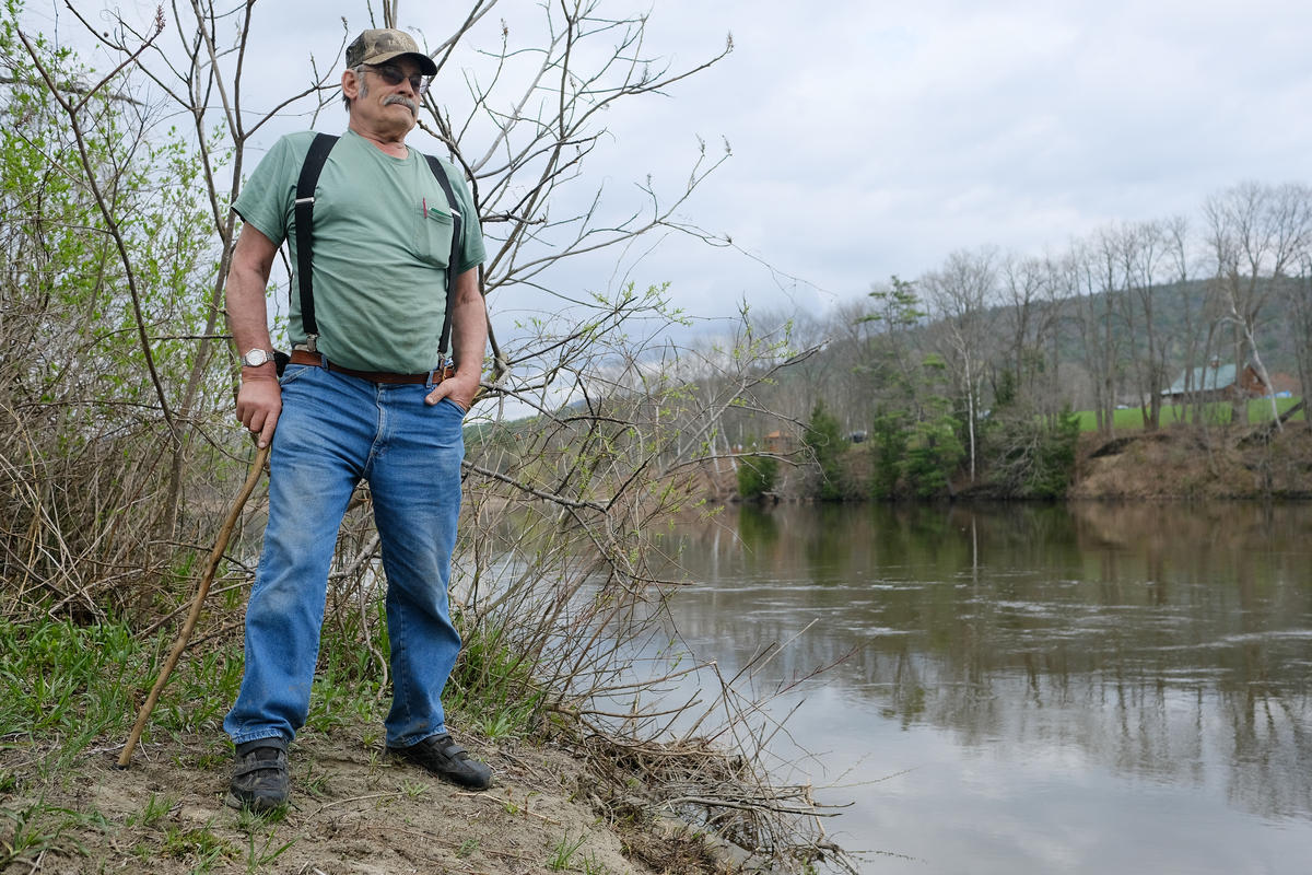 Steve Stocking has been farming the same land on the banks of the Connecticut River in Fairlee, Vermont for decades. He says rising and falling waters as a result of nearby dams are eroding his property — May 2018