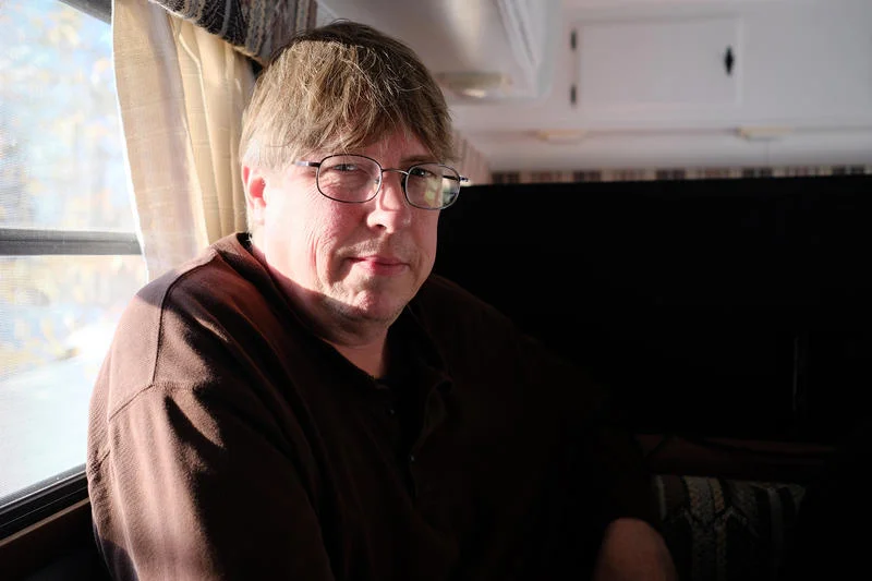 Mark Hollandbeck, a Free State follower, is the first of his family to make the move to New Hampshire from Indiana. He’s pictured here in his temporary home, a small trailer in Rindge, N.H. — April 2018