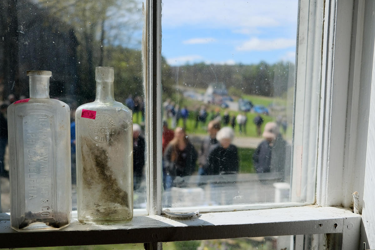 The view from inside the late Poet Laureate Donald Hall’s home in Wilmot, New Hampshire on the morning of his estate sale. Hundreds lined up outside to sort through his belongings — June 2019