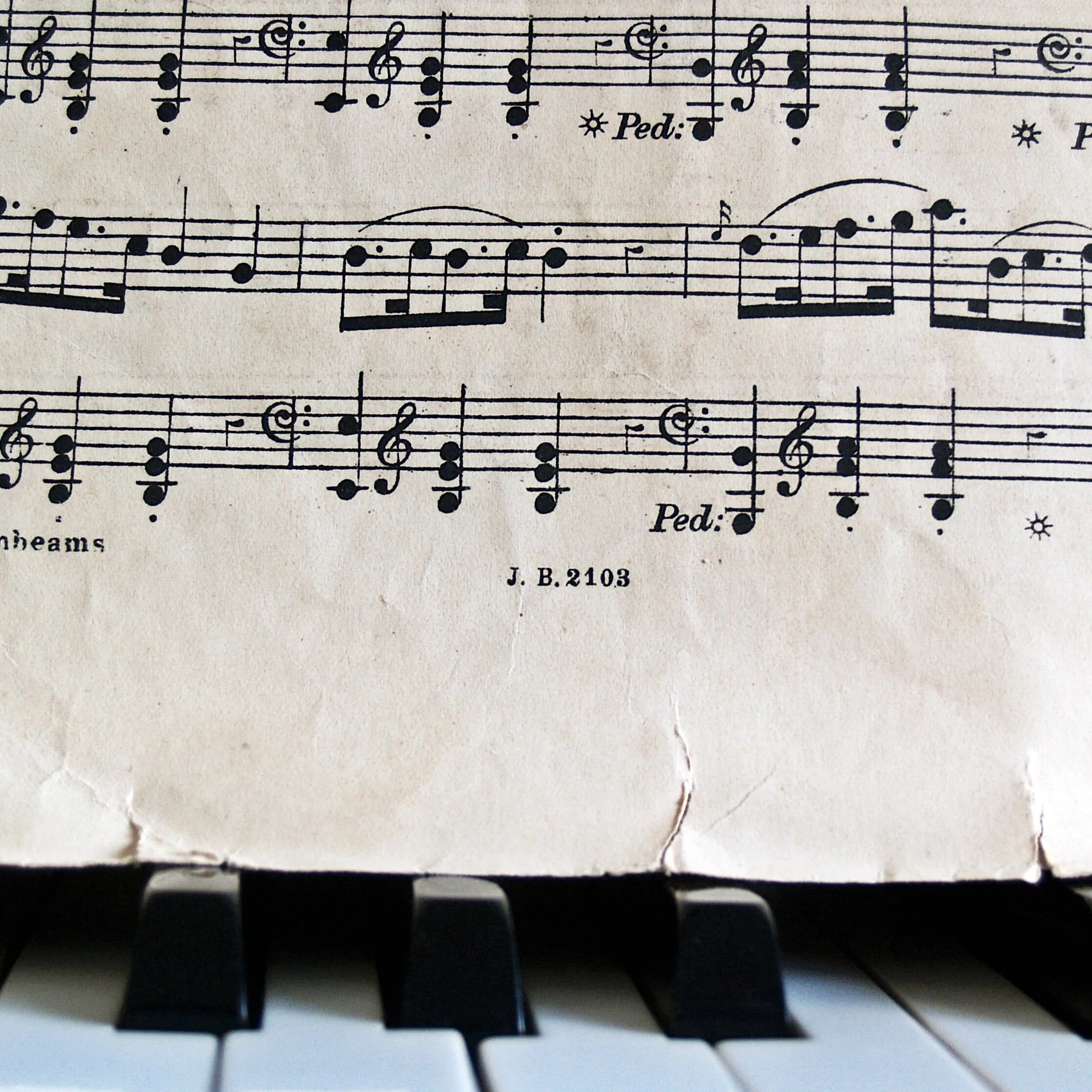 music-notes-and-sheet-music-on-a-piano.jpg