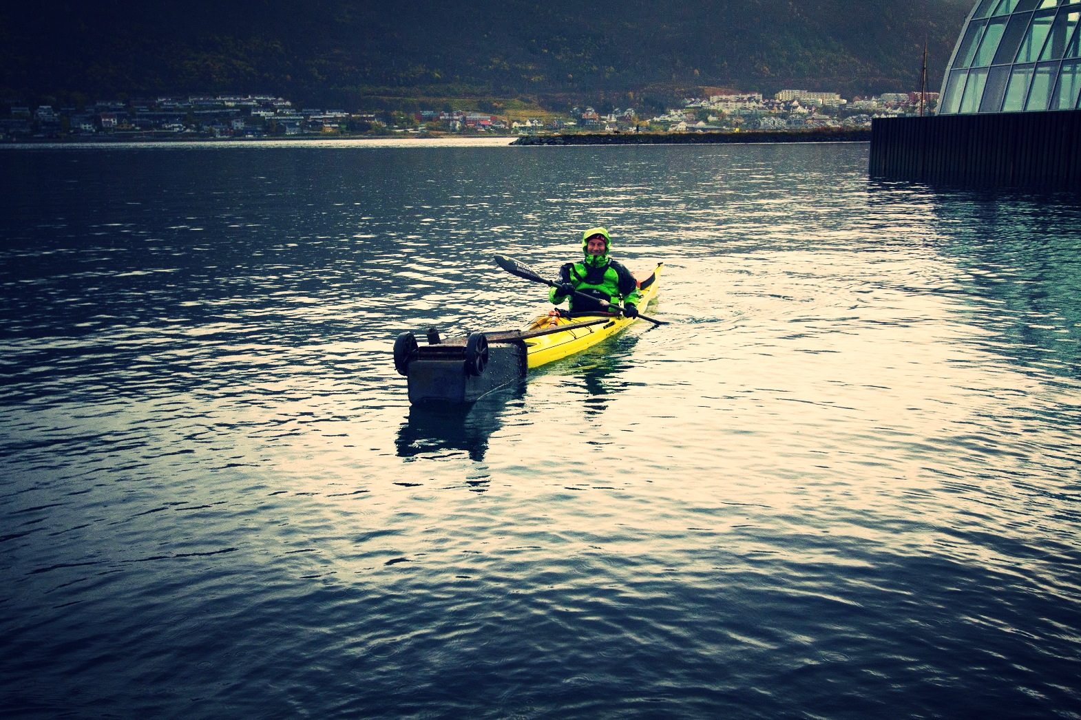 Kayakers from trulle (Simon) help collect underwater litter with divers from the Tromsø harbour during clean up operation, 2017, Photo Morgan Bender