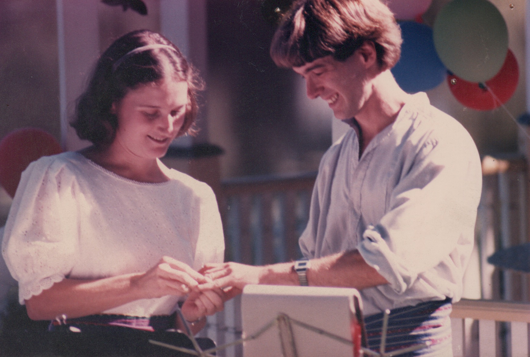 The ring ceremony. Martha Crusius and Tom Lent