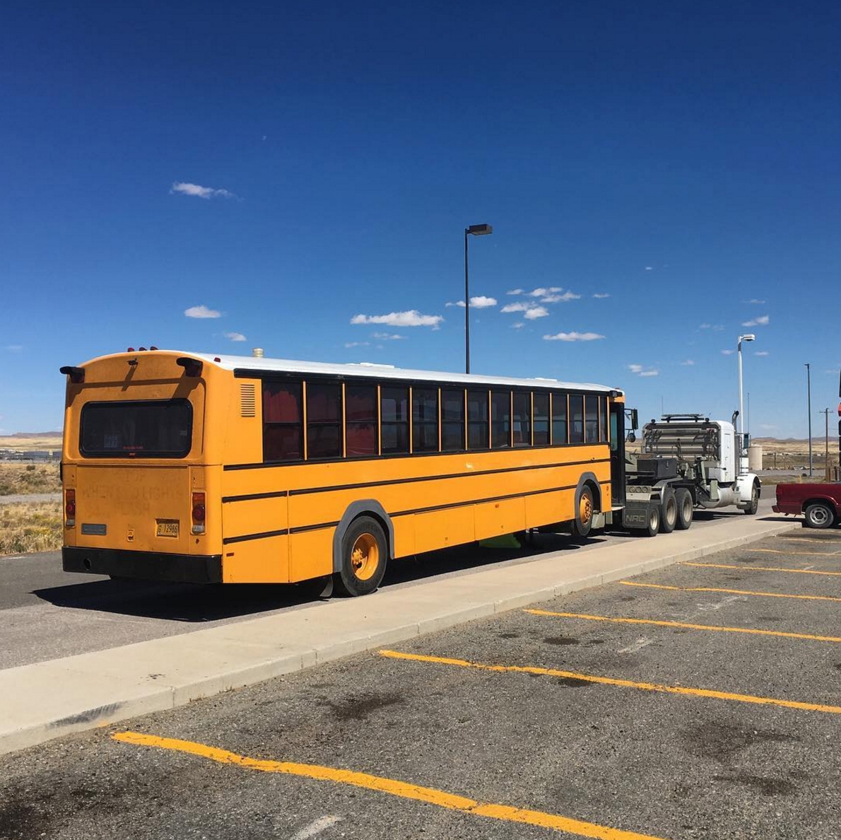 My bus being towed in Wyomming in 2016. Thankfully, I had CoachNet insurance, which covered 100% of the cost of the tow!