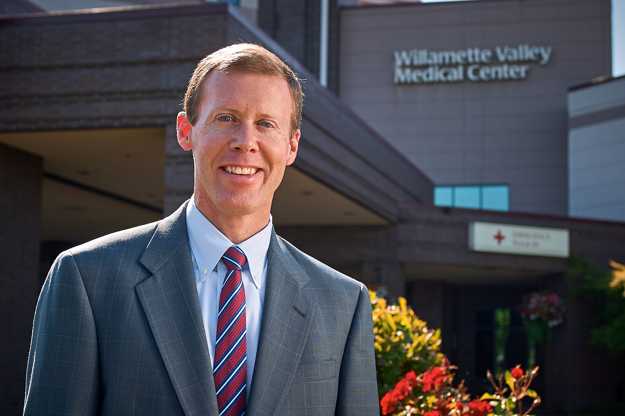 CFO in Front of Hospital Entrance, Willamette Valley Medical Center, McMinnville, Oregon