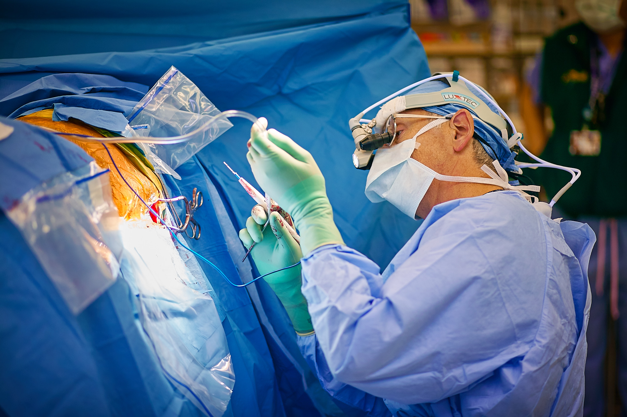 Surgeon Performing Spinal Surgery, Portland, Oregon