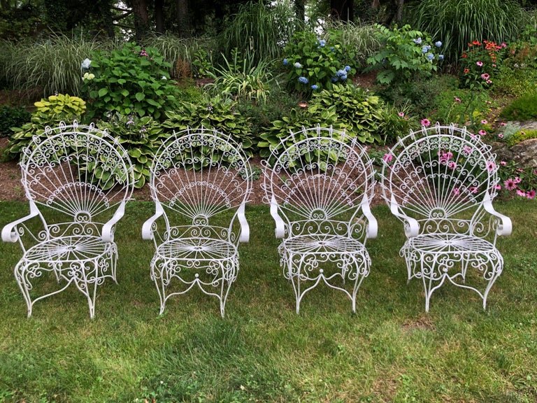 Set of Four Vintage Salterini White Peacock Chairs.jpg