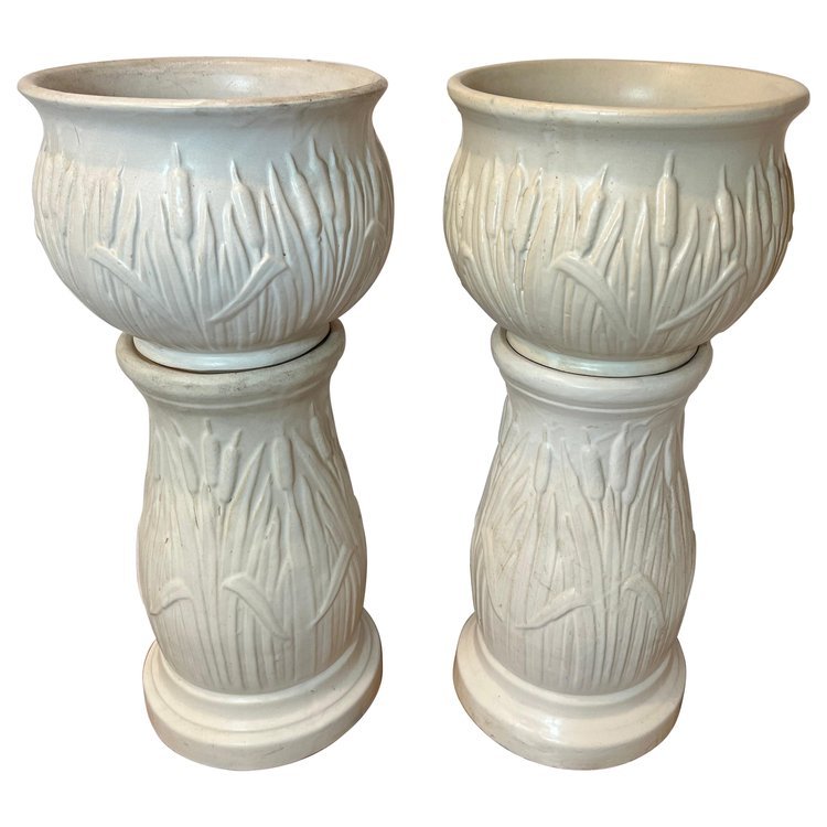 Pair of McCoy Pottery Jardiniere and Pedestals with a Cattail Design