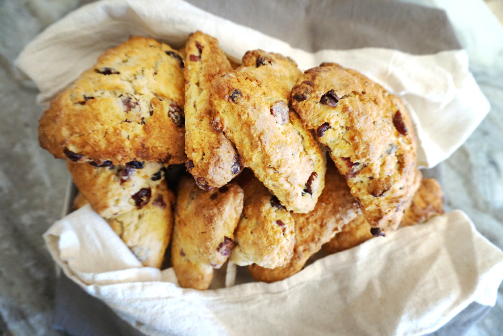 I make these scones every year for our family holiday brunch. I have tried to vary the recipe but always seem to come back to cranberry. These aren't too sweet and go great with coffee and conversation. 