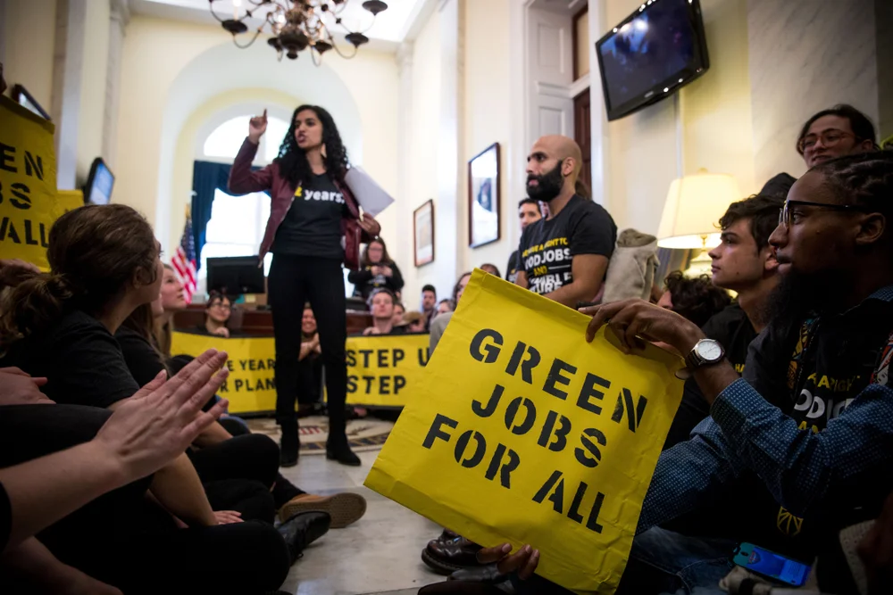 Sunrise activists protest at nancy Pelosi’s office. Rachael Warriner/shutterstock