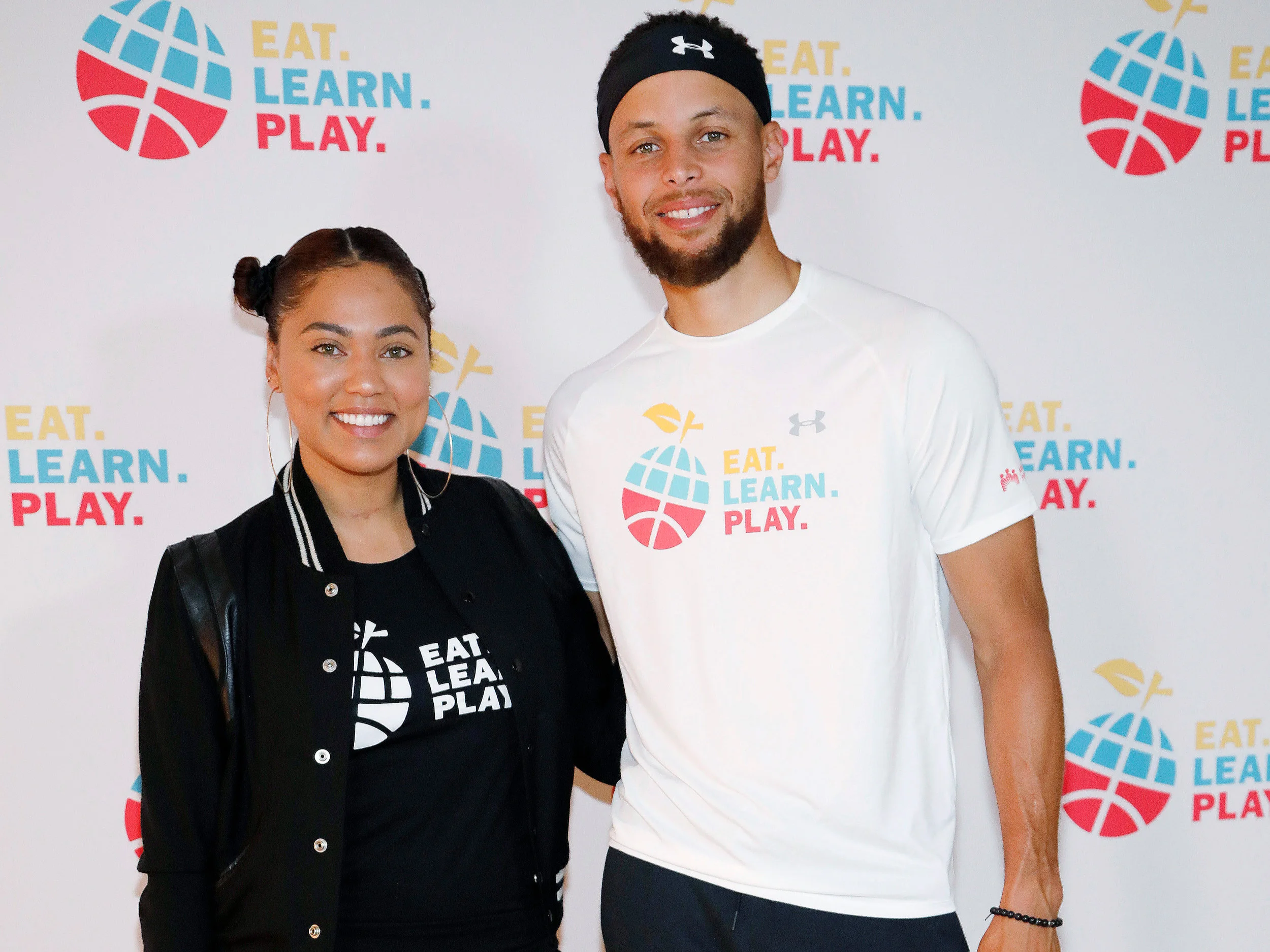 Ayesha and Stephen Curry celebrate the launch of Eat. Learn. Play in Oakland