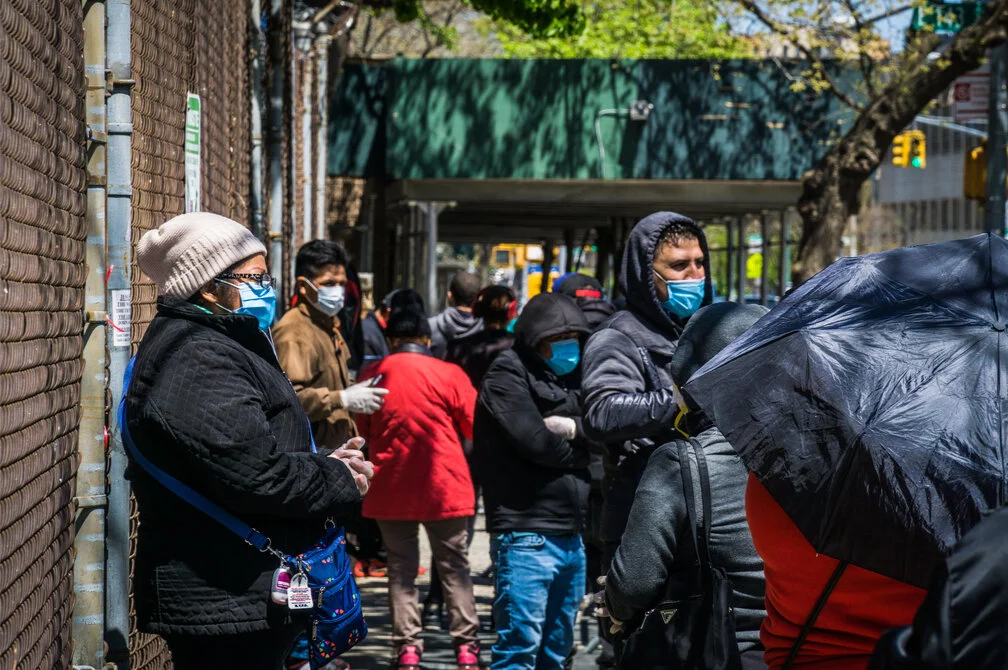 New yorkers wait at a Covid-19 walk-in testing site in The Bronx, one of the city’s hardest hit boroughs. Steve Sanchez Photos/Shutterstock