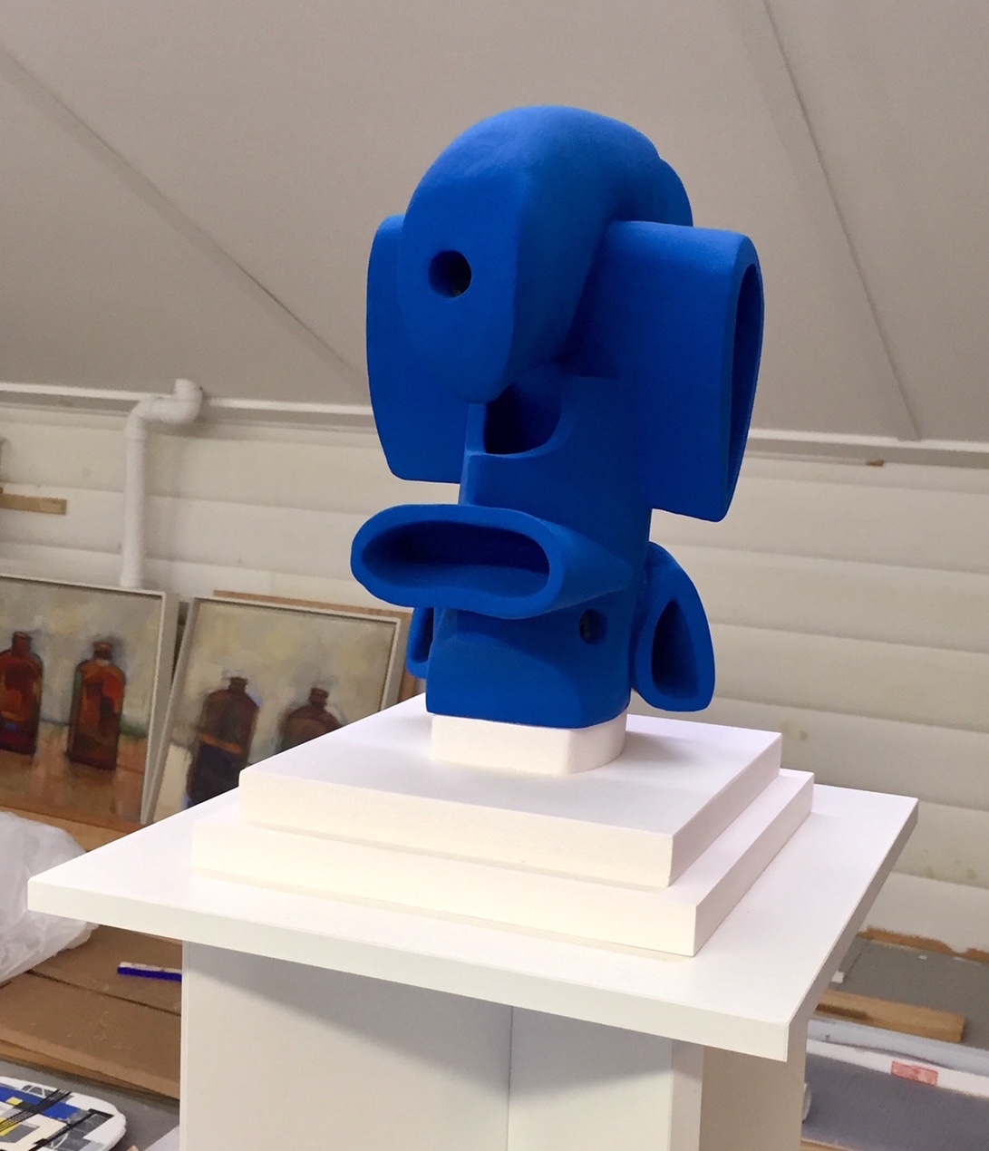 "Slinky Blue Jr." (mounted on wooden base)