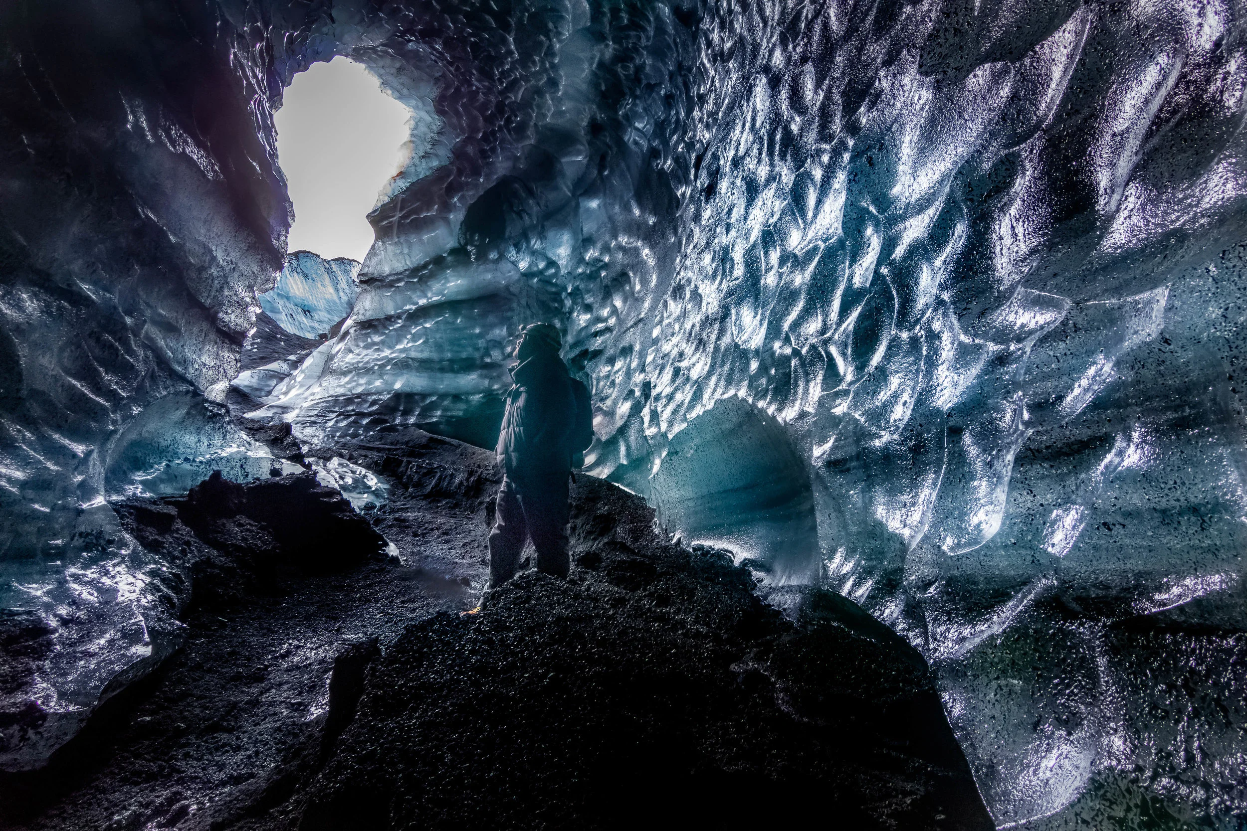 My boyfriend, Bob, looking cozy inside a glacier that sits atop the Katla Volcano