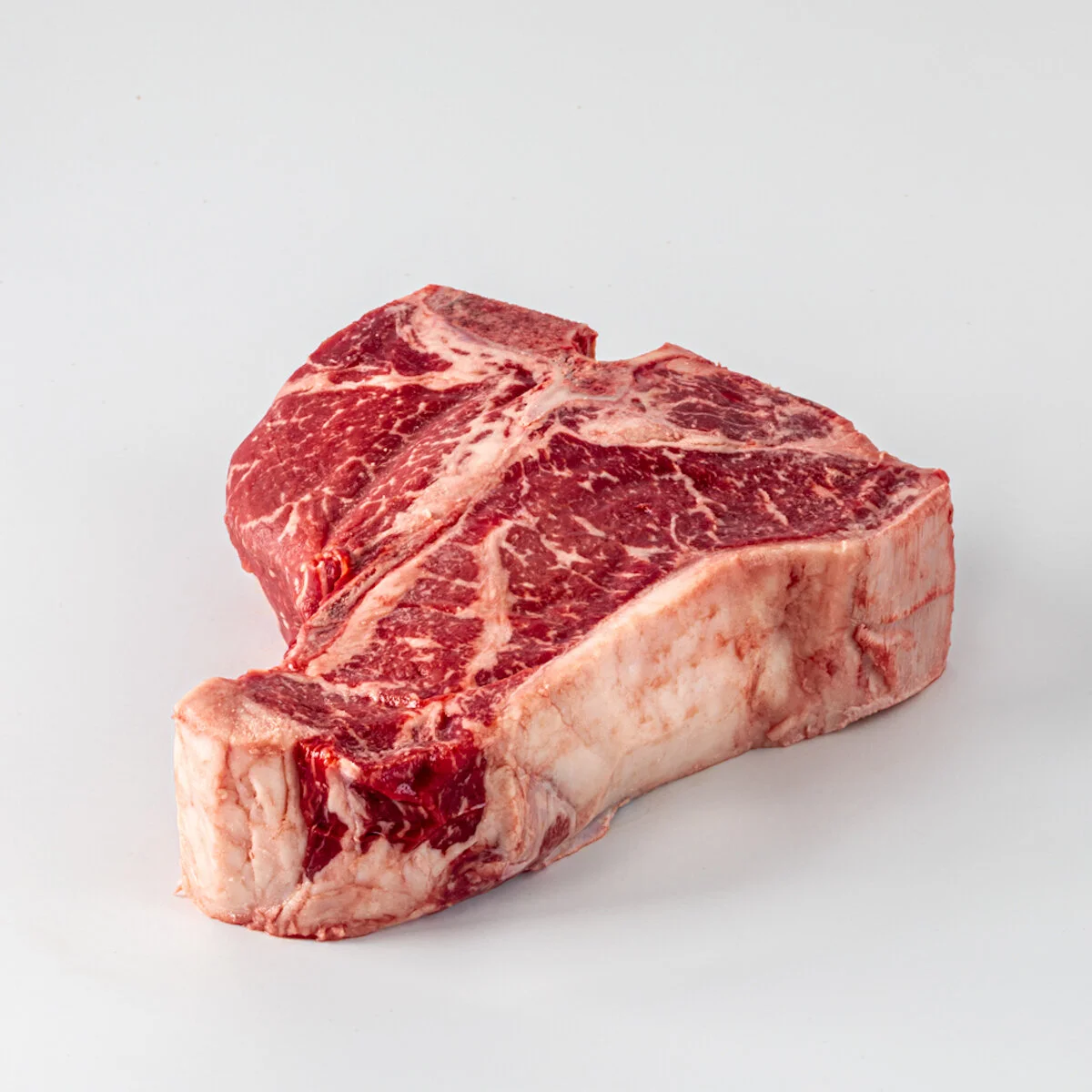 PROOF-JHP_PLF_TBoneSteak_Raw.jpg
