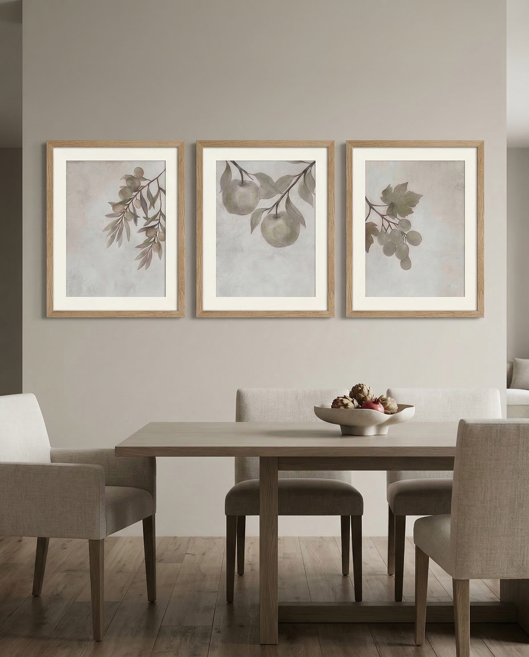 three_botanical_prints_in_oak_frames.png