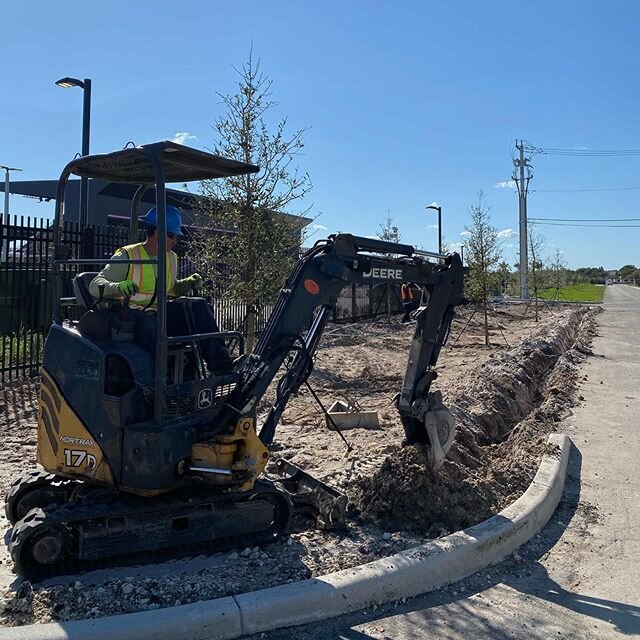 Irrigation Tech Marvin Madrid working hard on laying down irrigation rough.