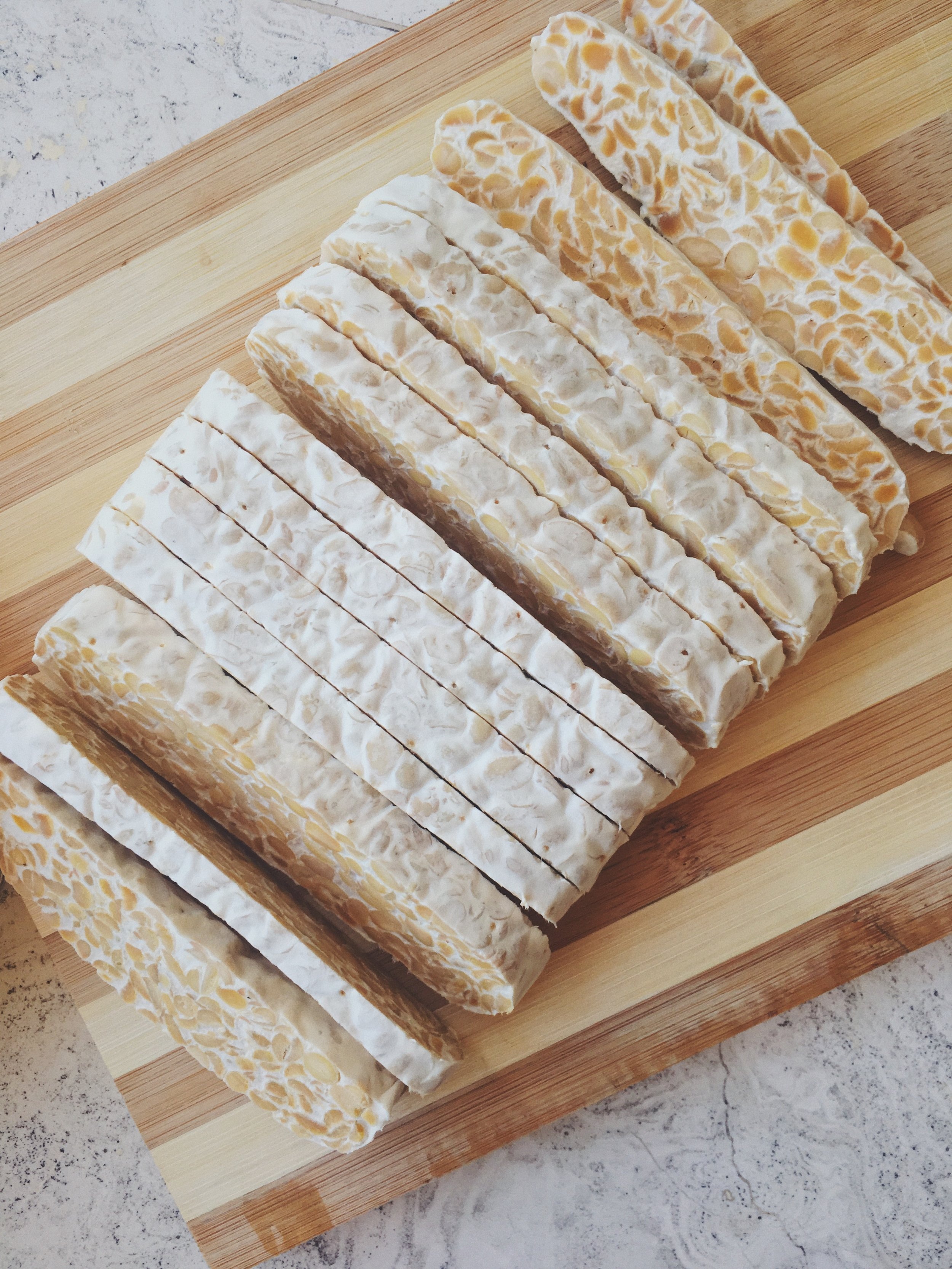 raw tempeh. sliced to perfection. 