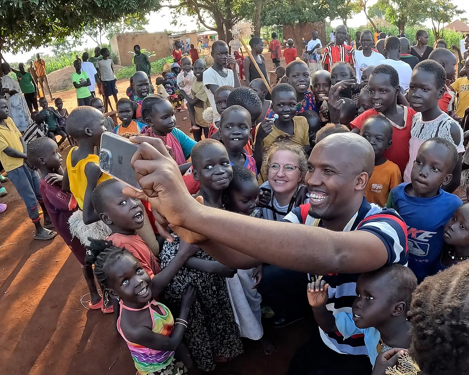  Snapping a few selfies during last year’s school supplies distribution in Bweyale. 