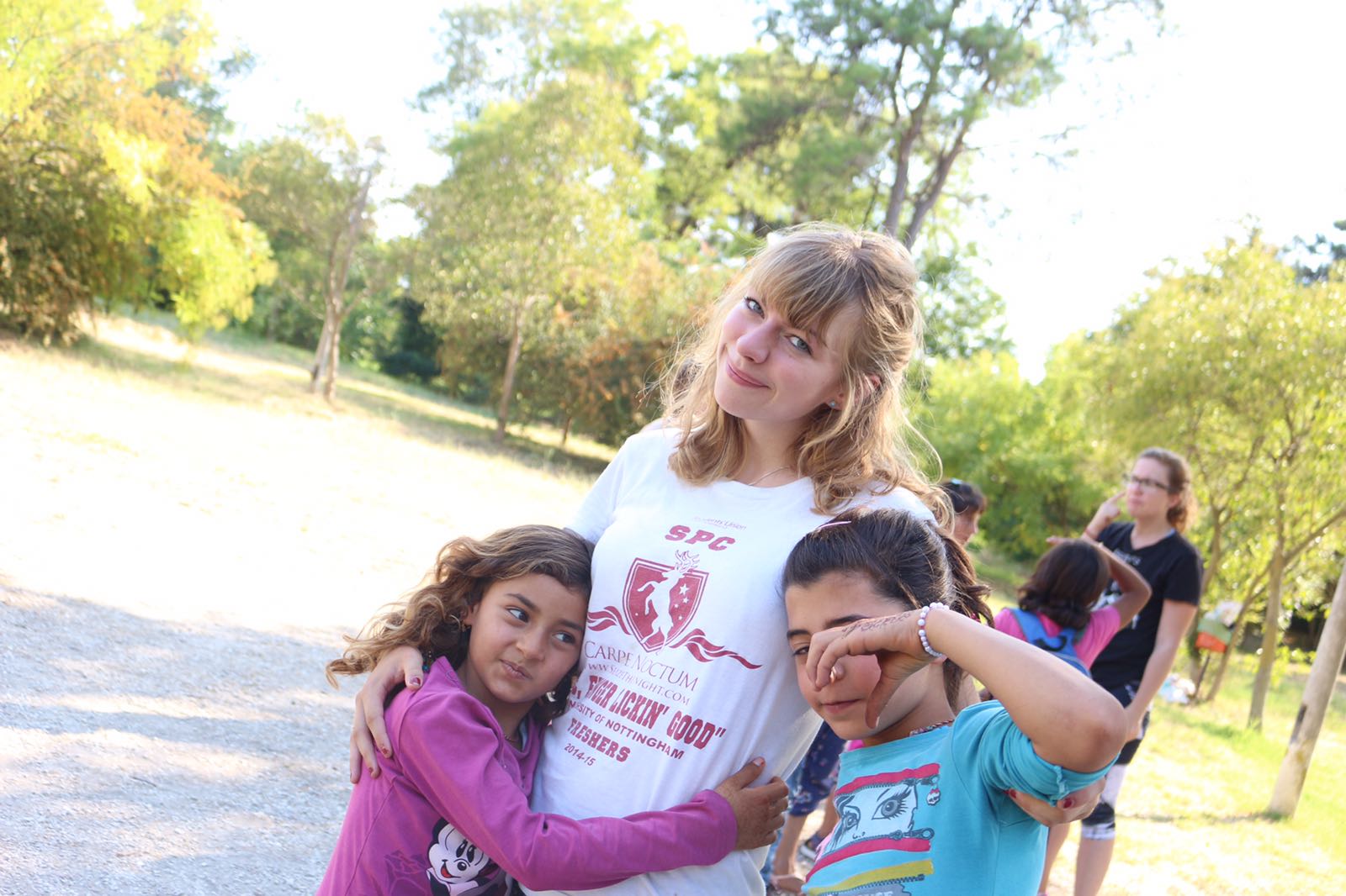 Beth with two adorable Yazidi children in Serres, Greece