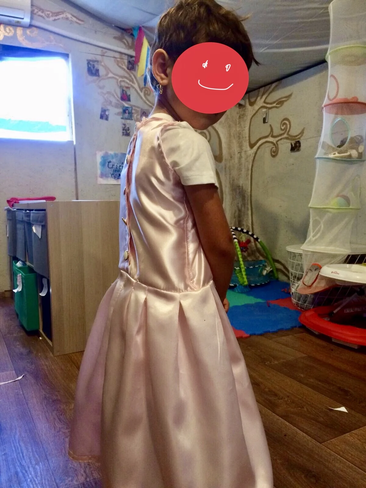 This dress is MAD SKILLS (Girl’s face covered to protect identity)
