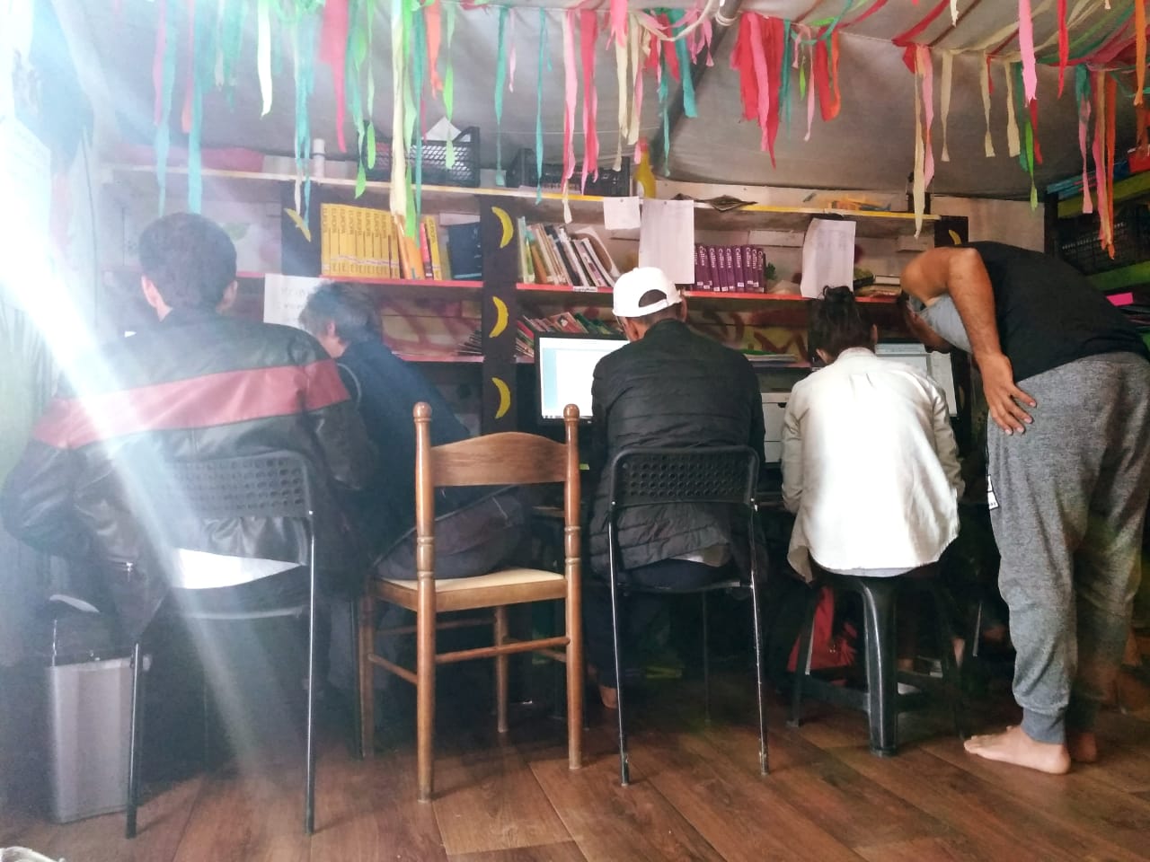  Computers provides a connection to the outside world for refugees from nearby camps. 