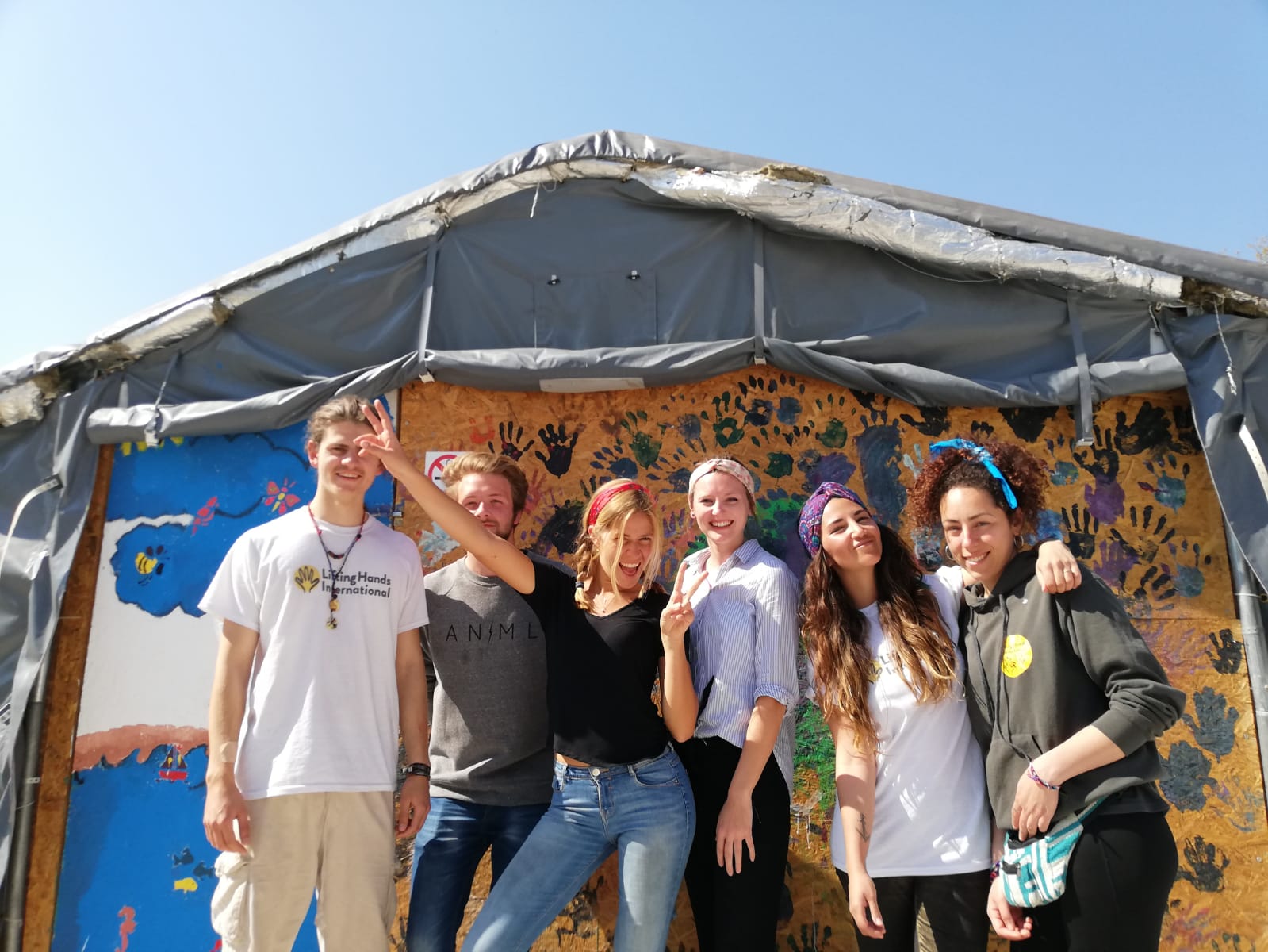Hannah (3rd from right) and the Child-Friendly Space team!
