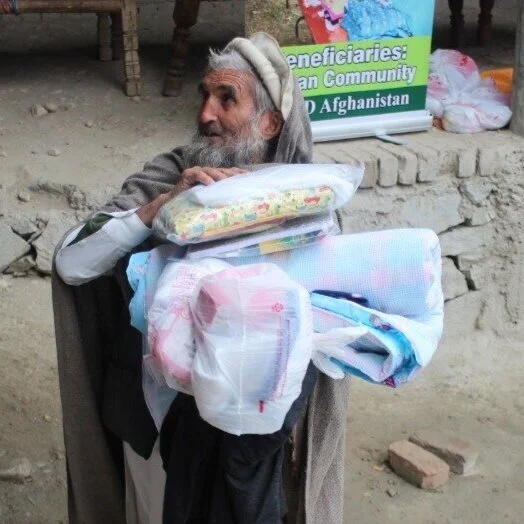 Blankets and other items made by volunteers in the US are distributed to refugees around the world.