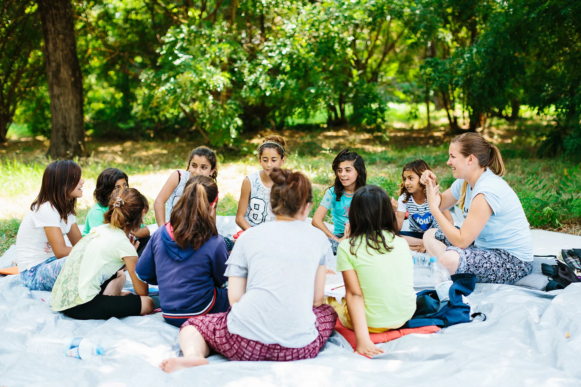   LHI’s classes and distributions continued in a public park after having to leave the camp.  