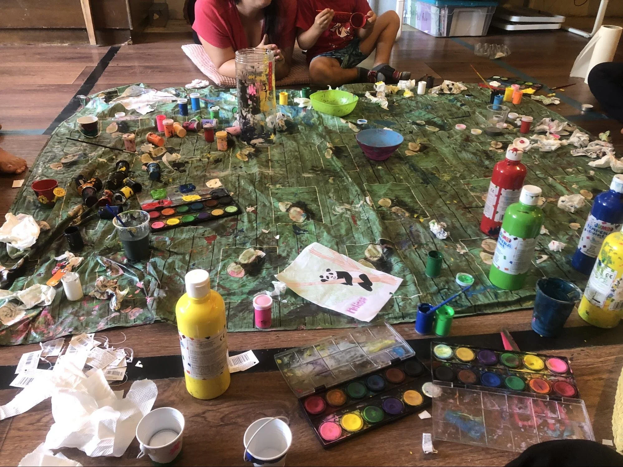   Kids enjoy painting and getting messy in the Child-Friendly Space in Serres, Greece.  