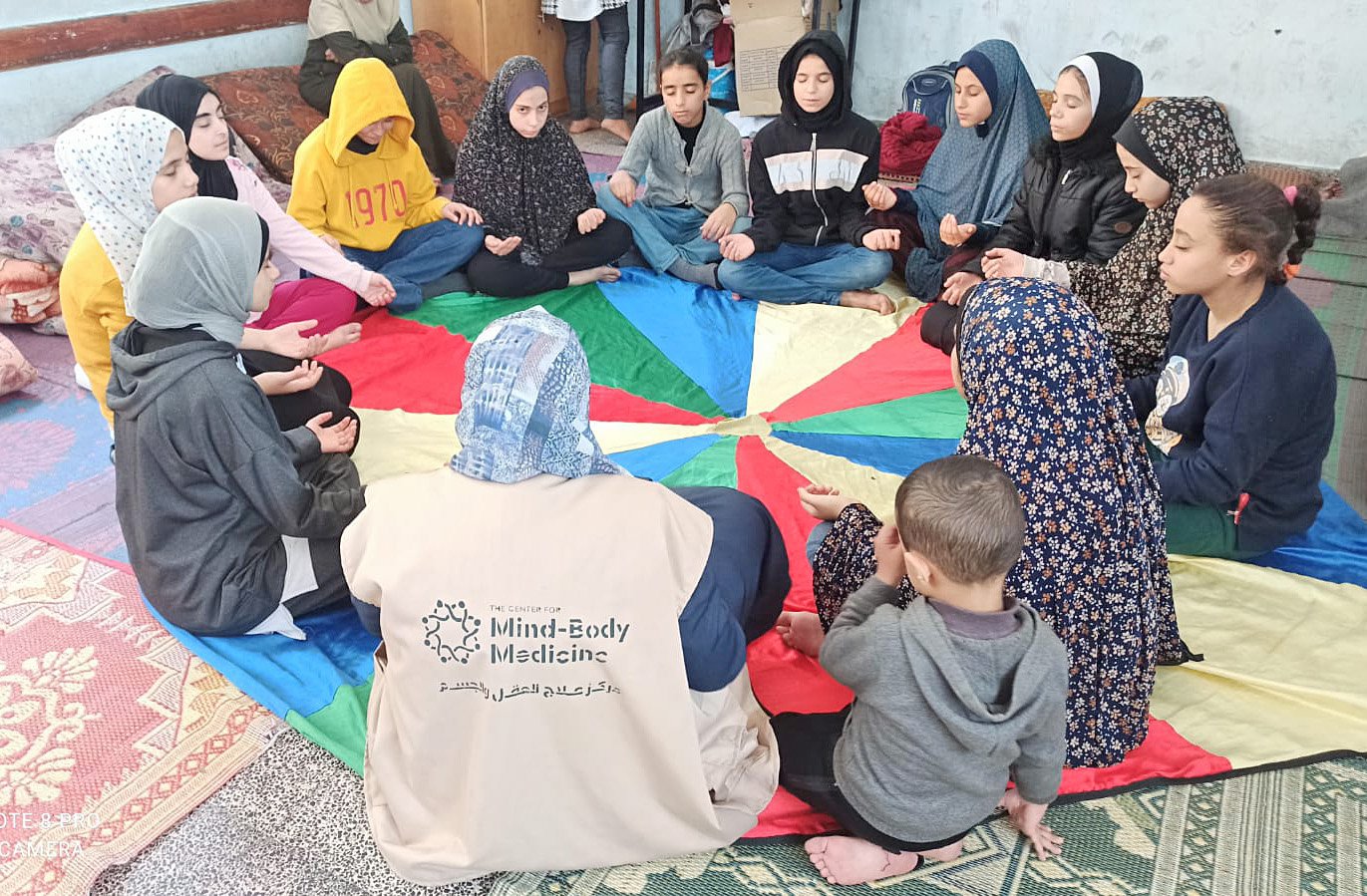 Relaxation exercise for displaced girls in Rafah.jpg