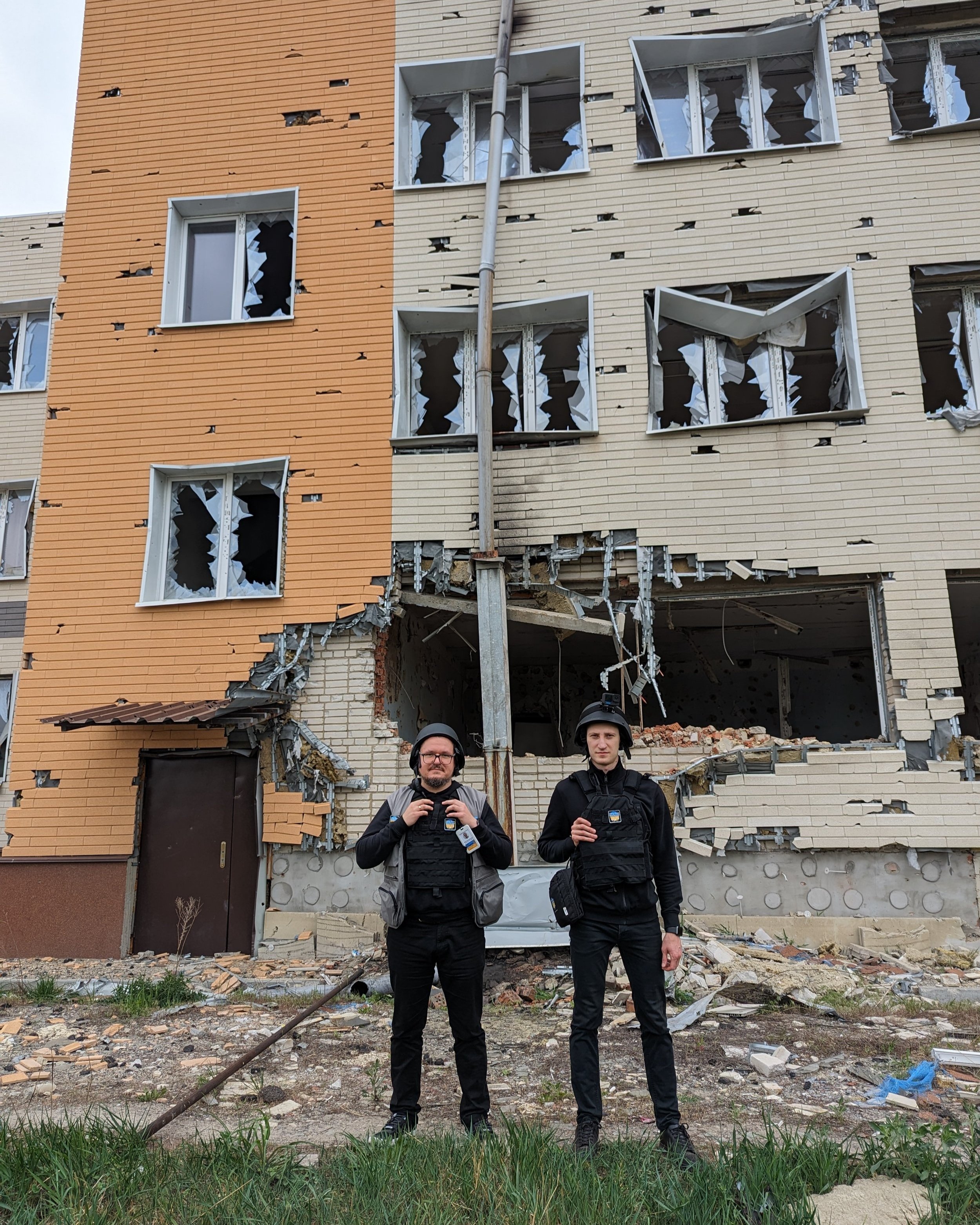  Ihor (left) stands in the village of Velyka Novosilka in Eastern Ukraine 