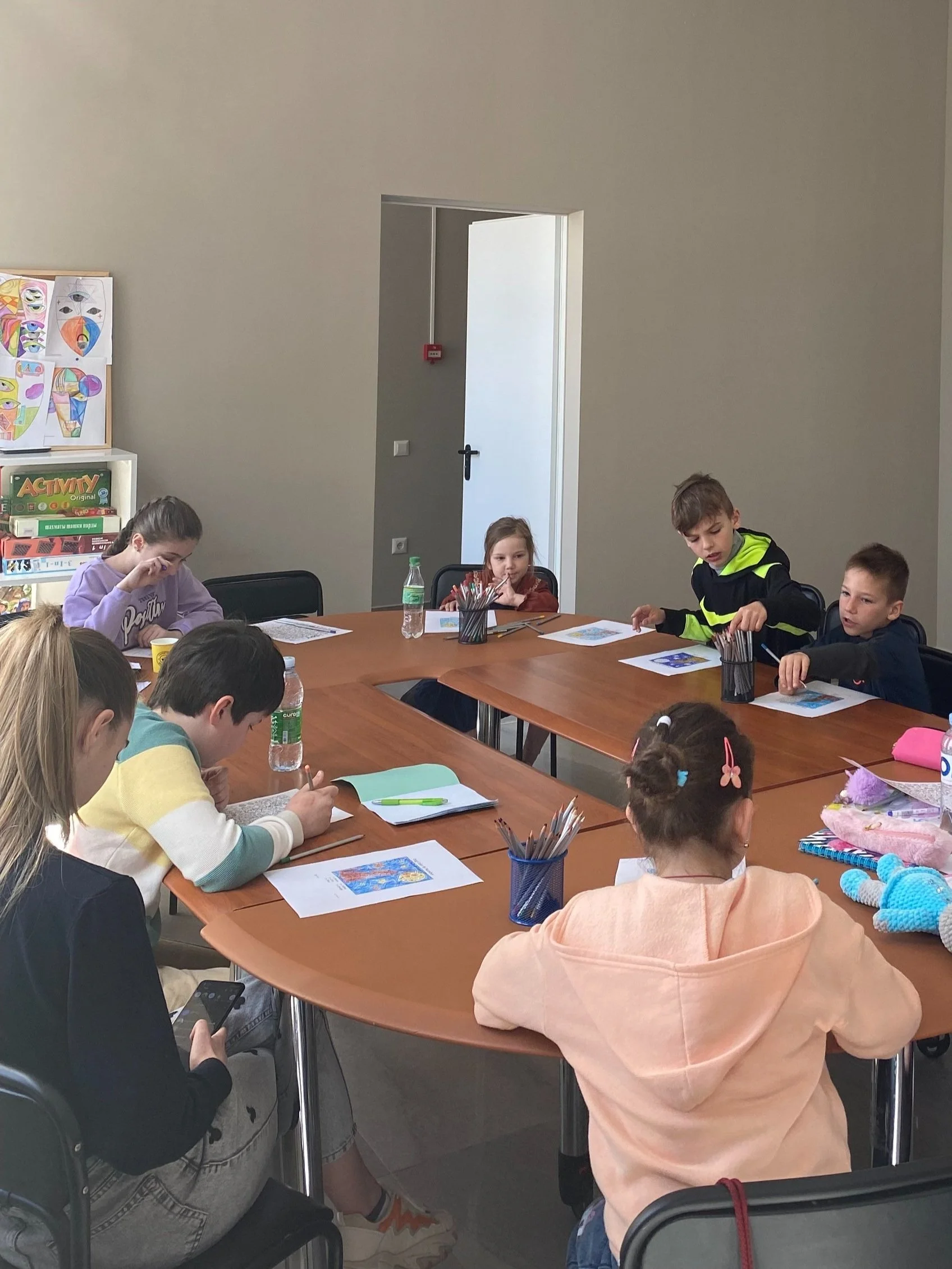  Children enjoy an art project at the LHI Community Center in Balti, Moldova. 