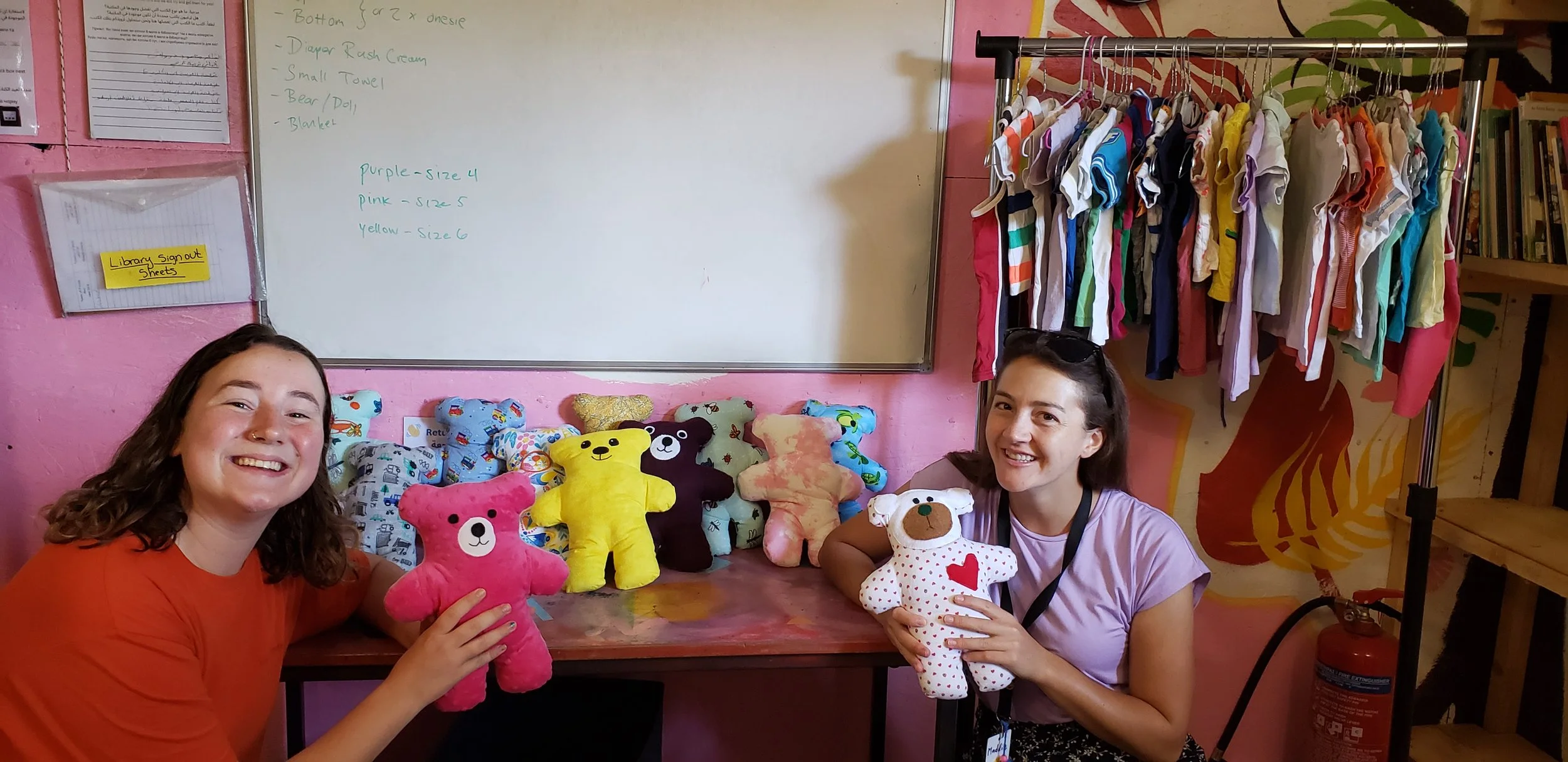  LHI Greece team members set up a free shop for parents and children to shop for toys, clothes, and baby supplies. 