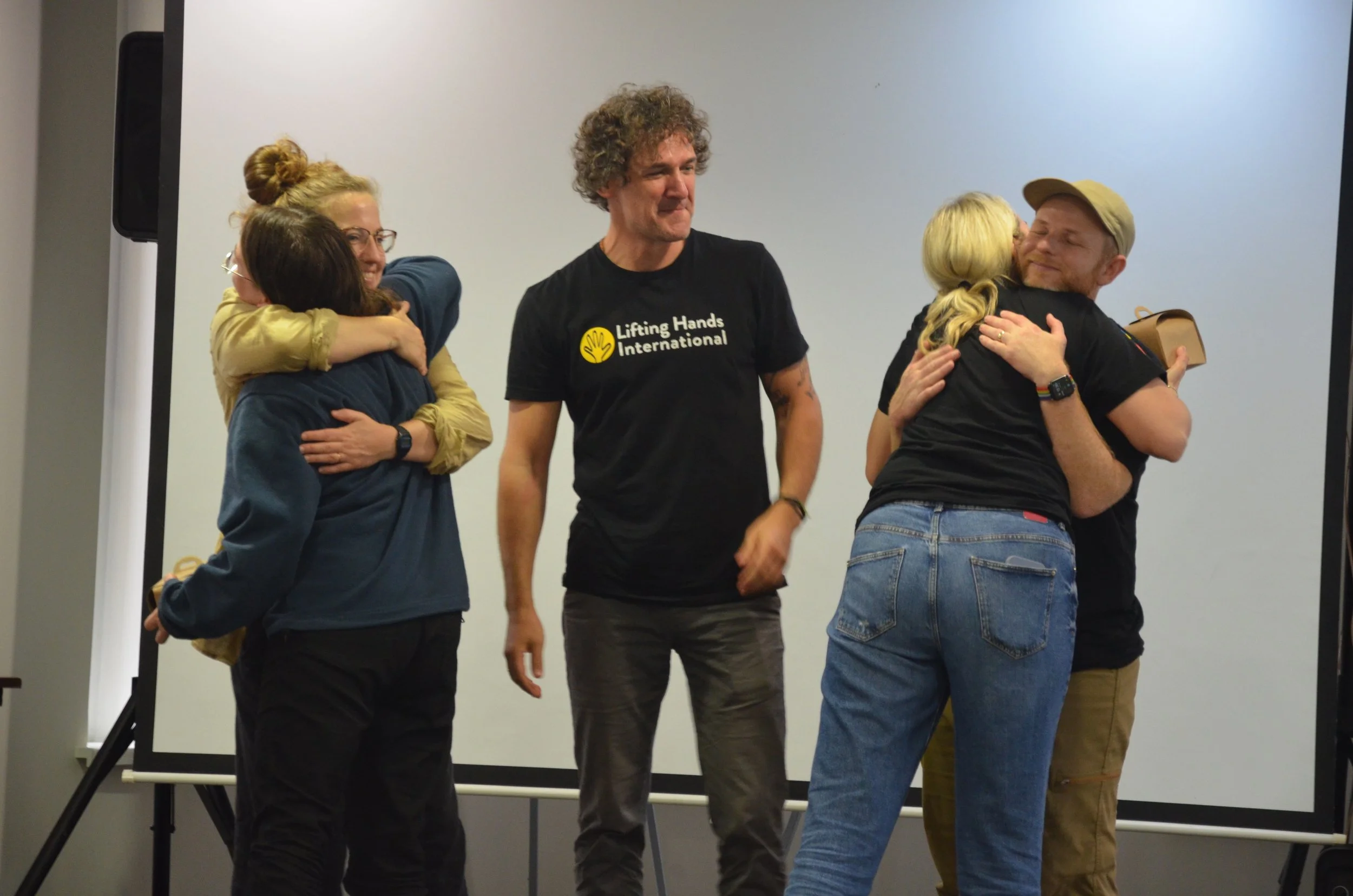  LHI Founder and Director Hayley, Director of Monitoring and Evaluation Jaron, and COO Walker say a fond farewell to Ukrainian team members. 