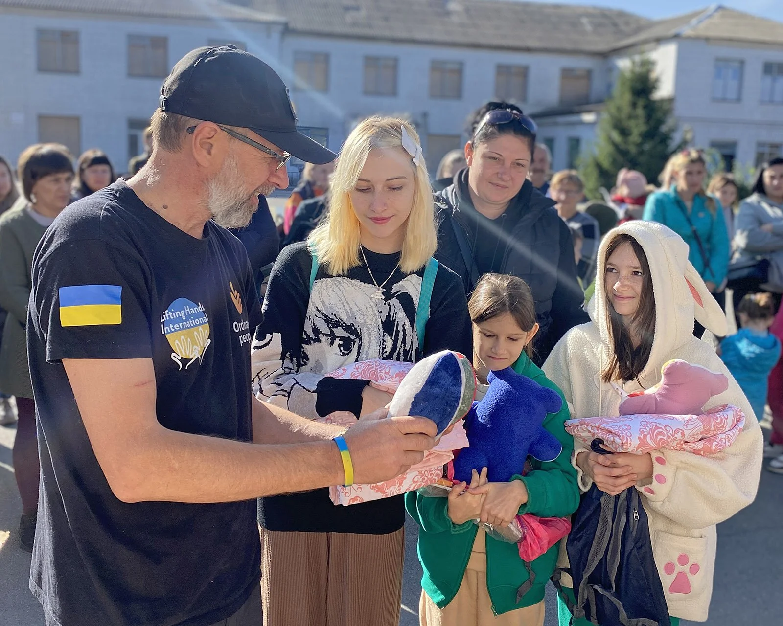  Yurii distributing toys to children in Prosiane. 
