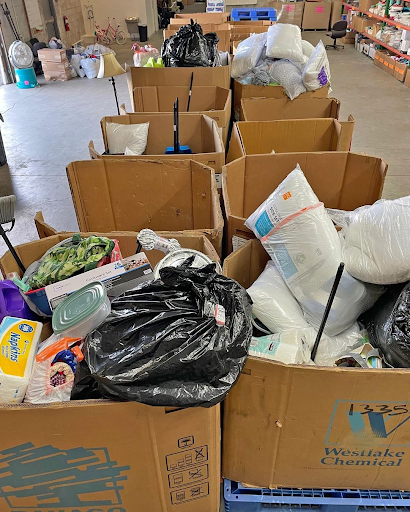  Each of these bins represents an apartment the LHI Welcome Program is preparing to set up for a newly-arrived family. The Welcome Program team makes sure that all items a family needs is there waiting for them. 