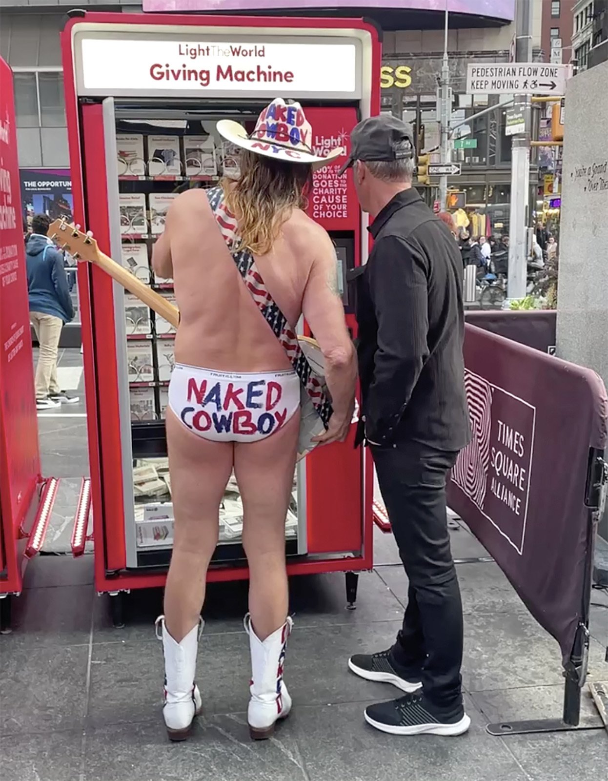  Even the world famous street performer and musician the Naked Cowboy can use the Giving Machines! 