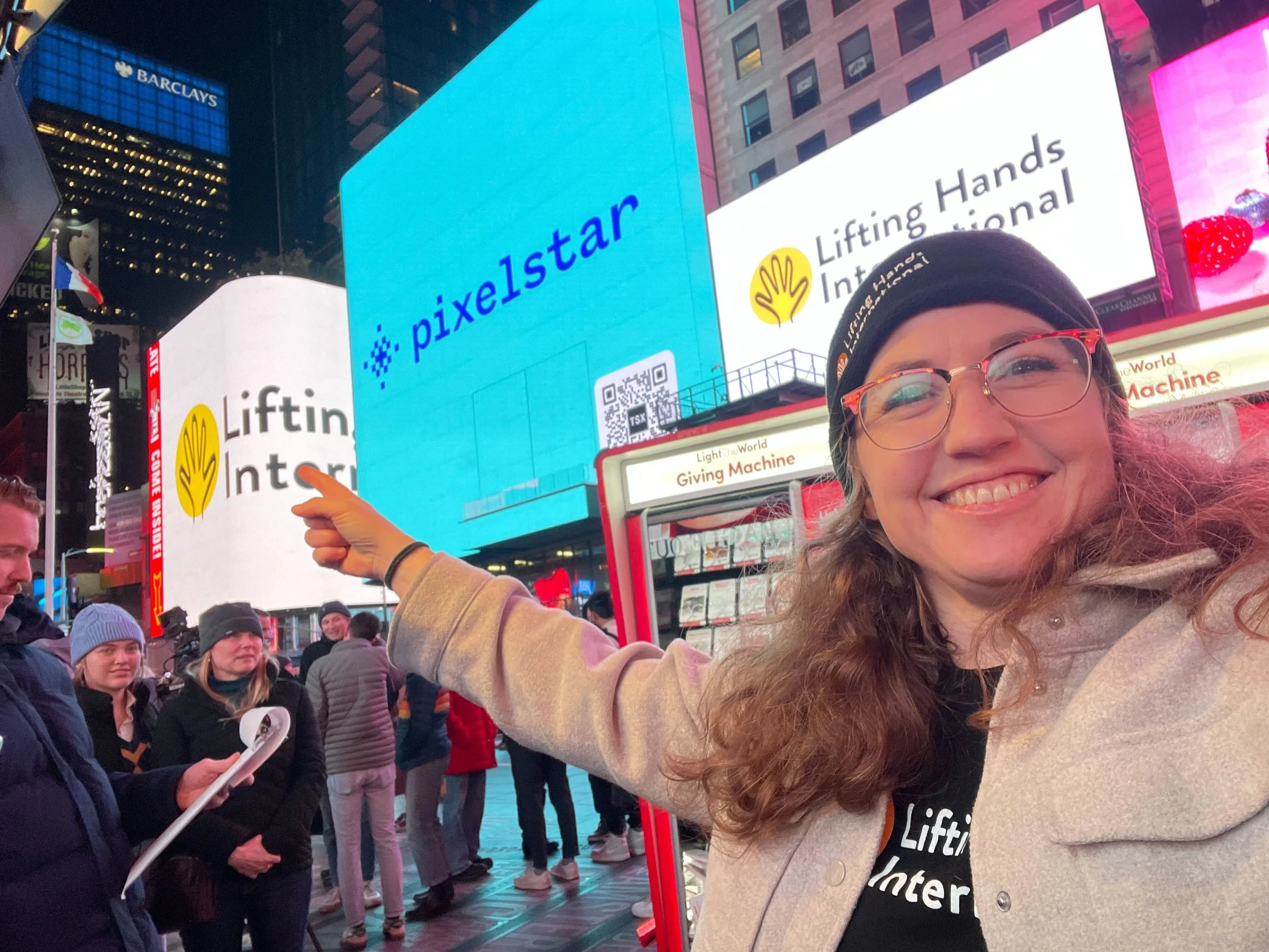  LHI Founder and Director Hayley Smith got to see the LHI logo in lights in Times Square at the opening of the New York City Giving Machines! 