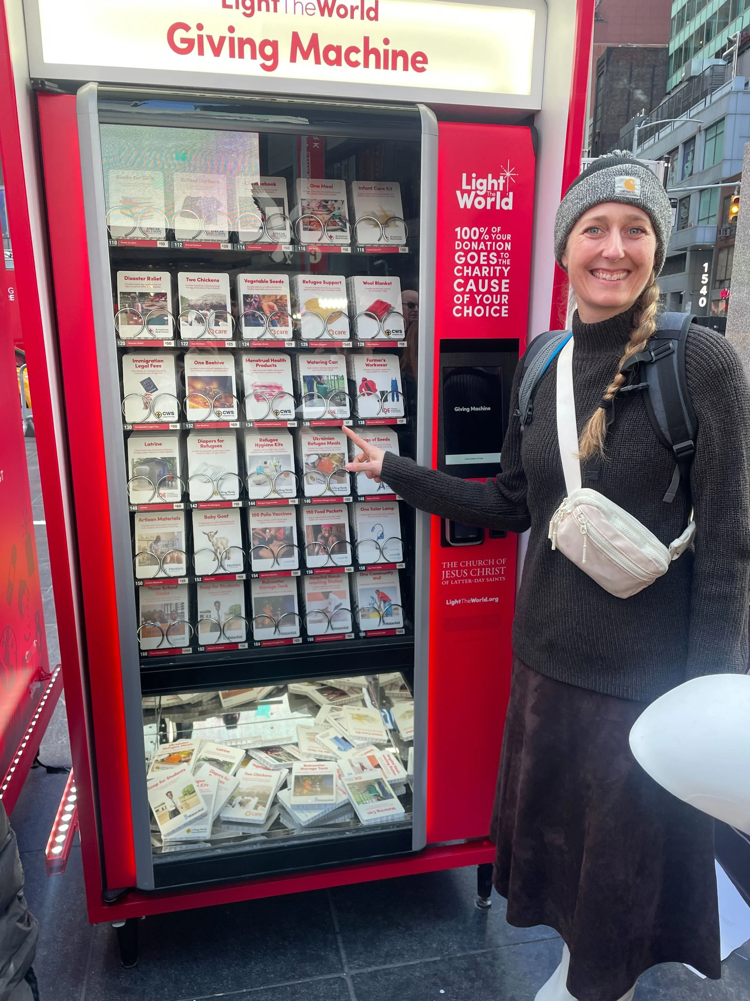  LHI's Outreach Director Jessica was so excited to see LHI featured in the Giving Machines in Times Square! 