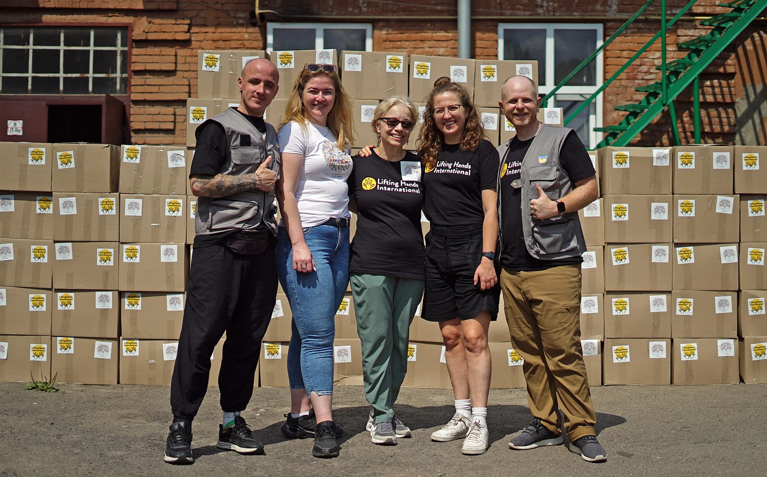  LHI Board of Directors Chairperson, Mary Carriero (center in sunglasses), traveled with members of the LHI crew to Jordan and Ukraine to check in on our operations there. 