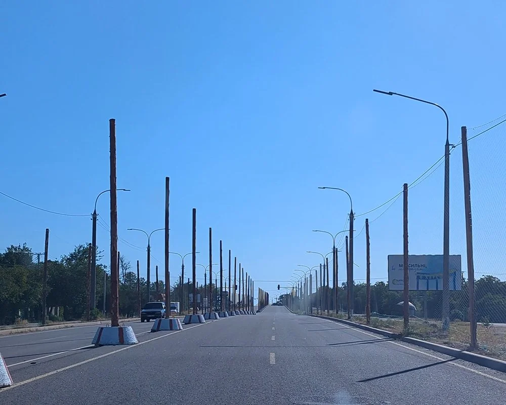  Netting stretched across the roadside. 