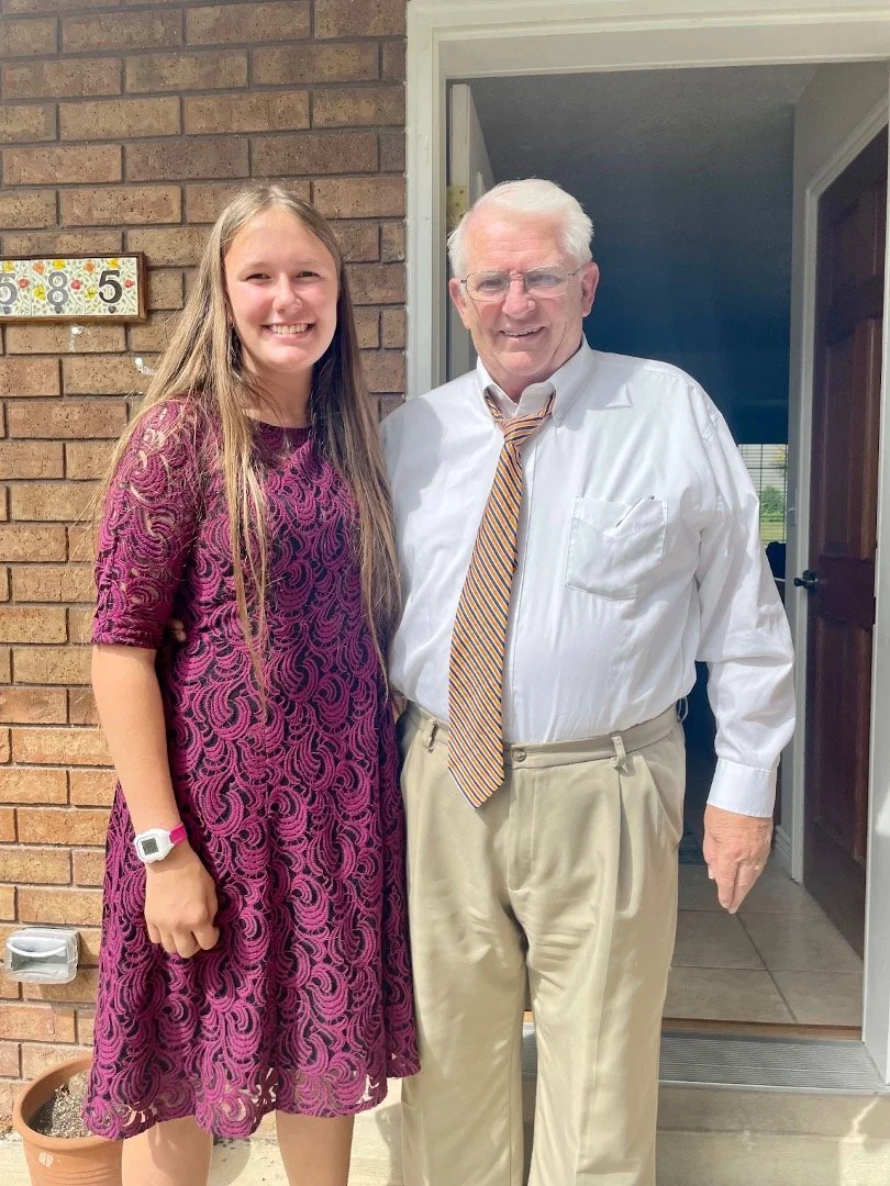  Zoe with her neighbor Harold who connected her with a donor family that matched the funds she and her friends and family raised for the Gather for Goats program. 