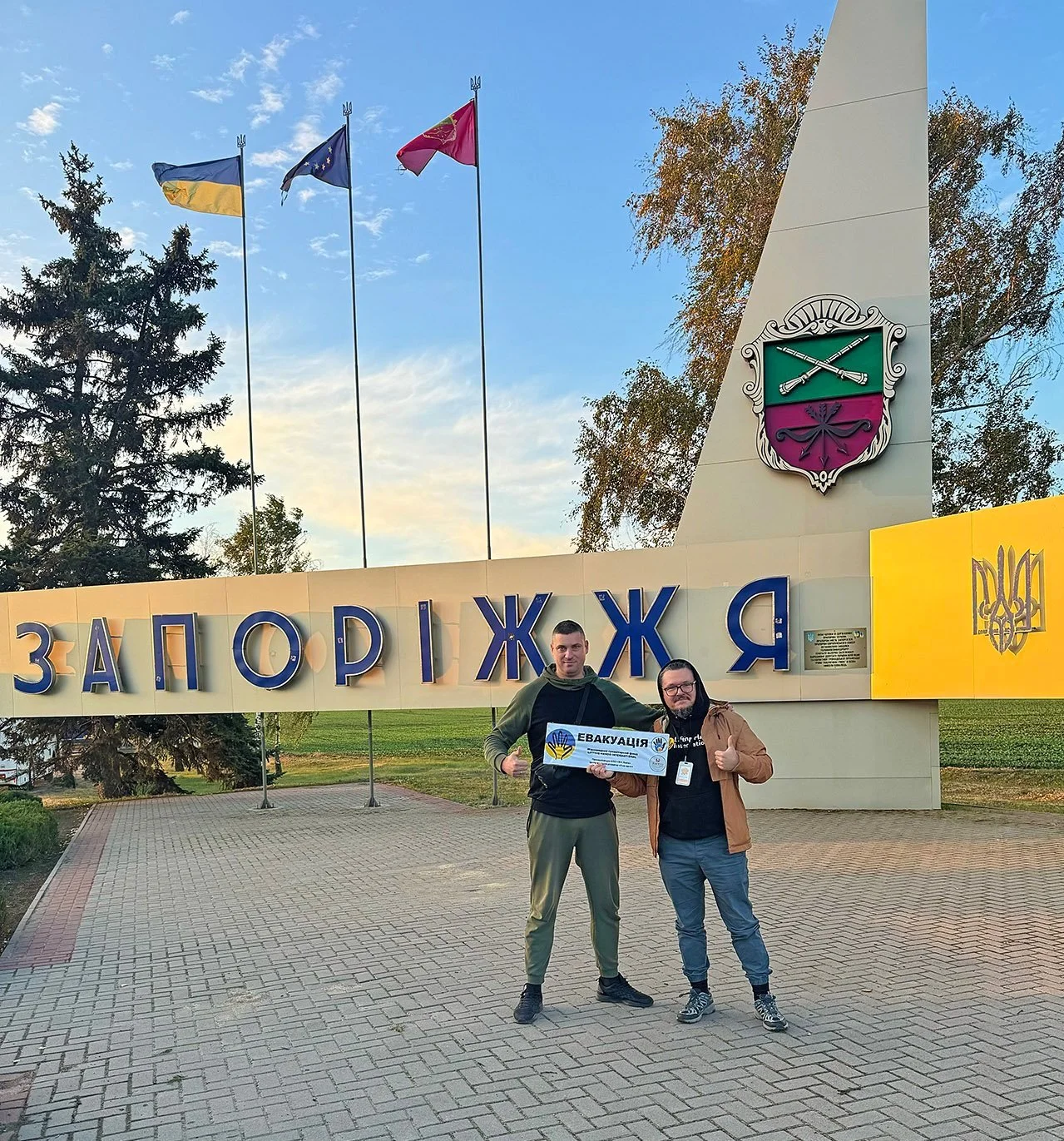  Ihor with Stas, LHI Lviv Shelter manager and evacuation coordinator from NGO I Am Not Alone, at the entrance to Zaporizhzhia city. 