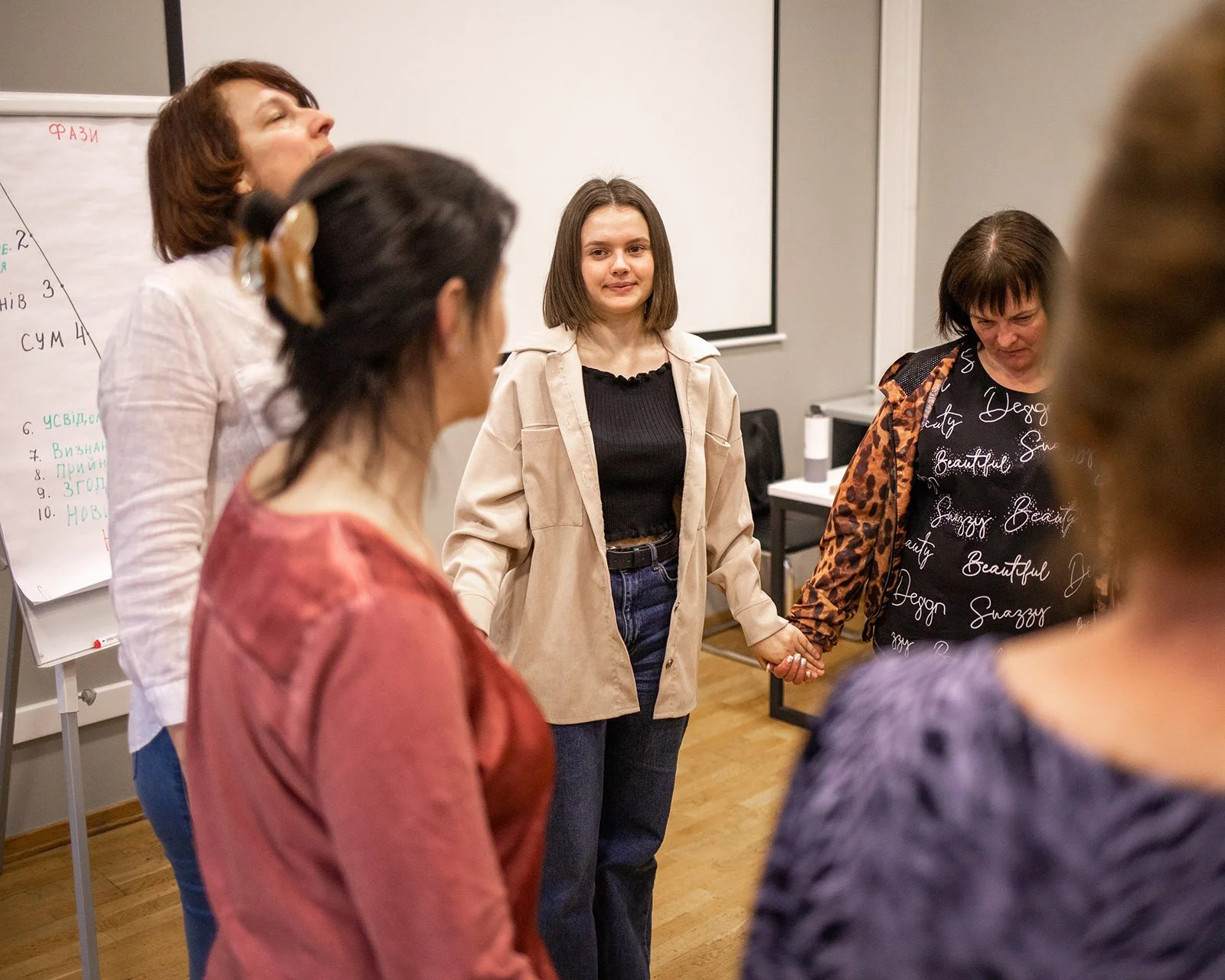  A group therapy session for women who have lost a loved one to the war. 