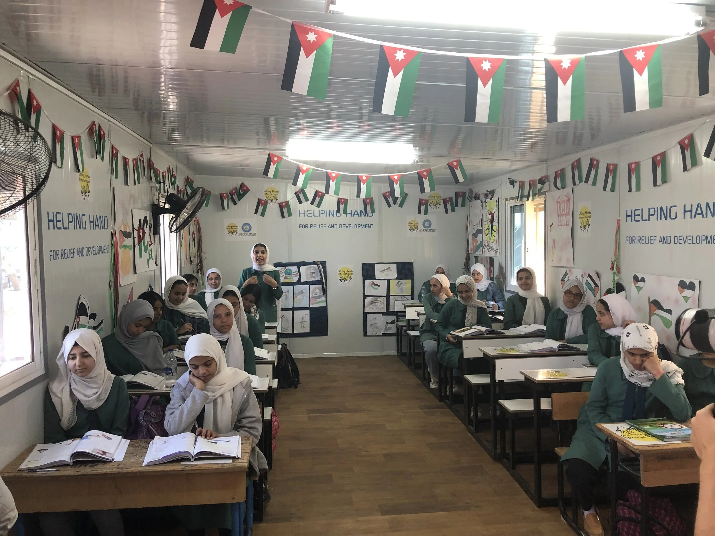  Many Syrian students are able to attend school in Jordan thanks to these innovative modular classrooms. Don’t you love seeing all the amazing work on the walls? Oh, and the LHI logos aren’t to shabby either! 