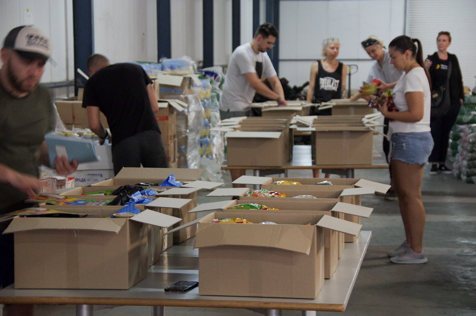  Volunteers packing food aid boxes.  