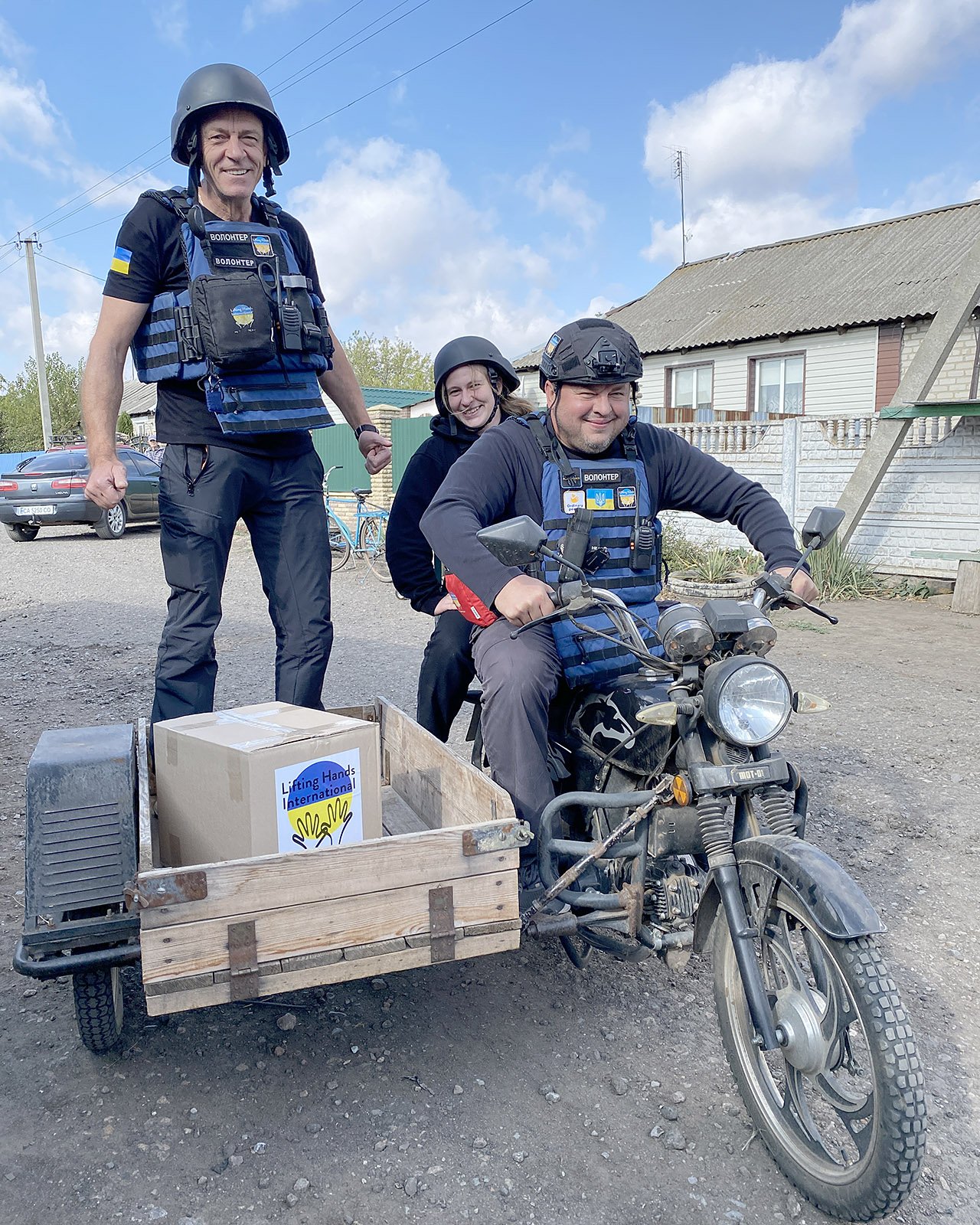  Anastasiia, Yurii, and Oleh heading into Odradne village.&nbsp; 