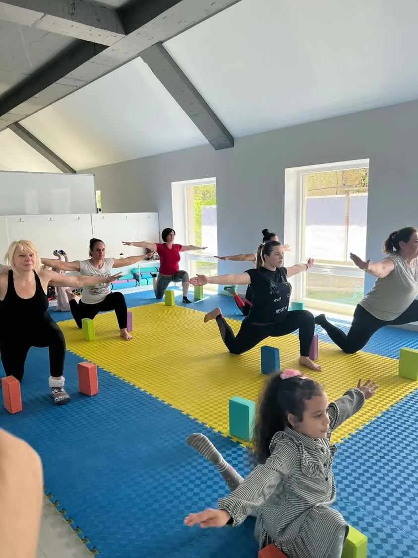  These community members enjoy a fitness class at the LHI Community Center in Moldova. 